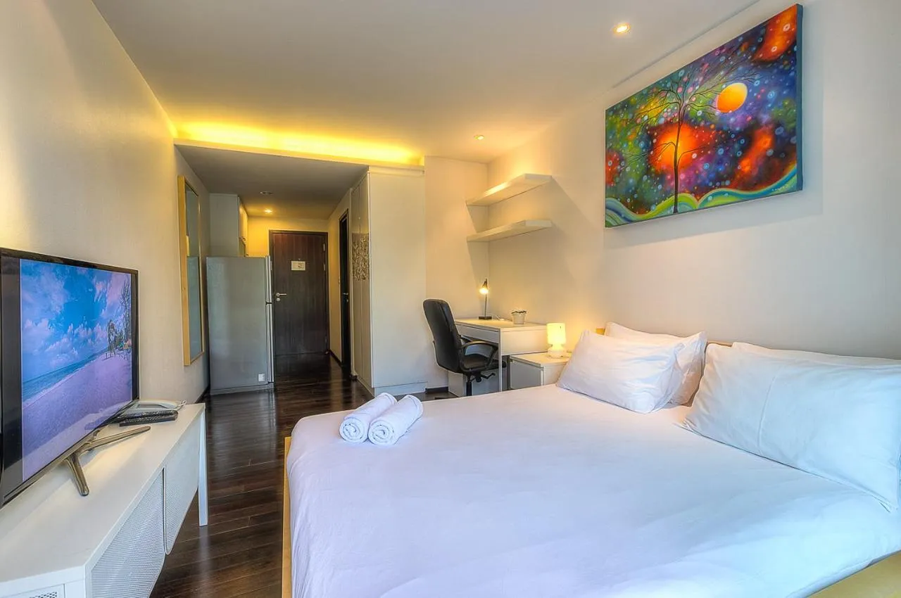 Photo of the whole room, Bed in The Title Comfort Condotel