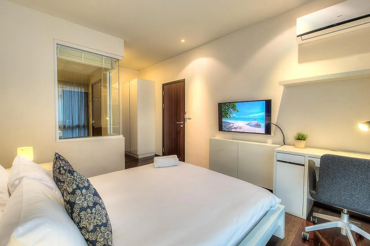 Photo of the whole room, Bed in The Title Comfort Condotel