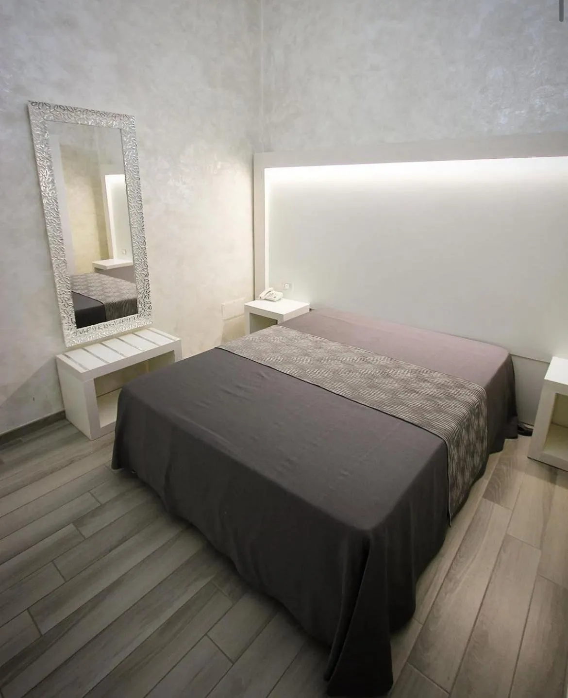 Bed in Hotel Paladini