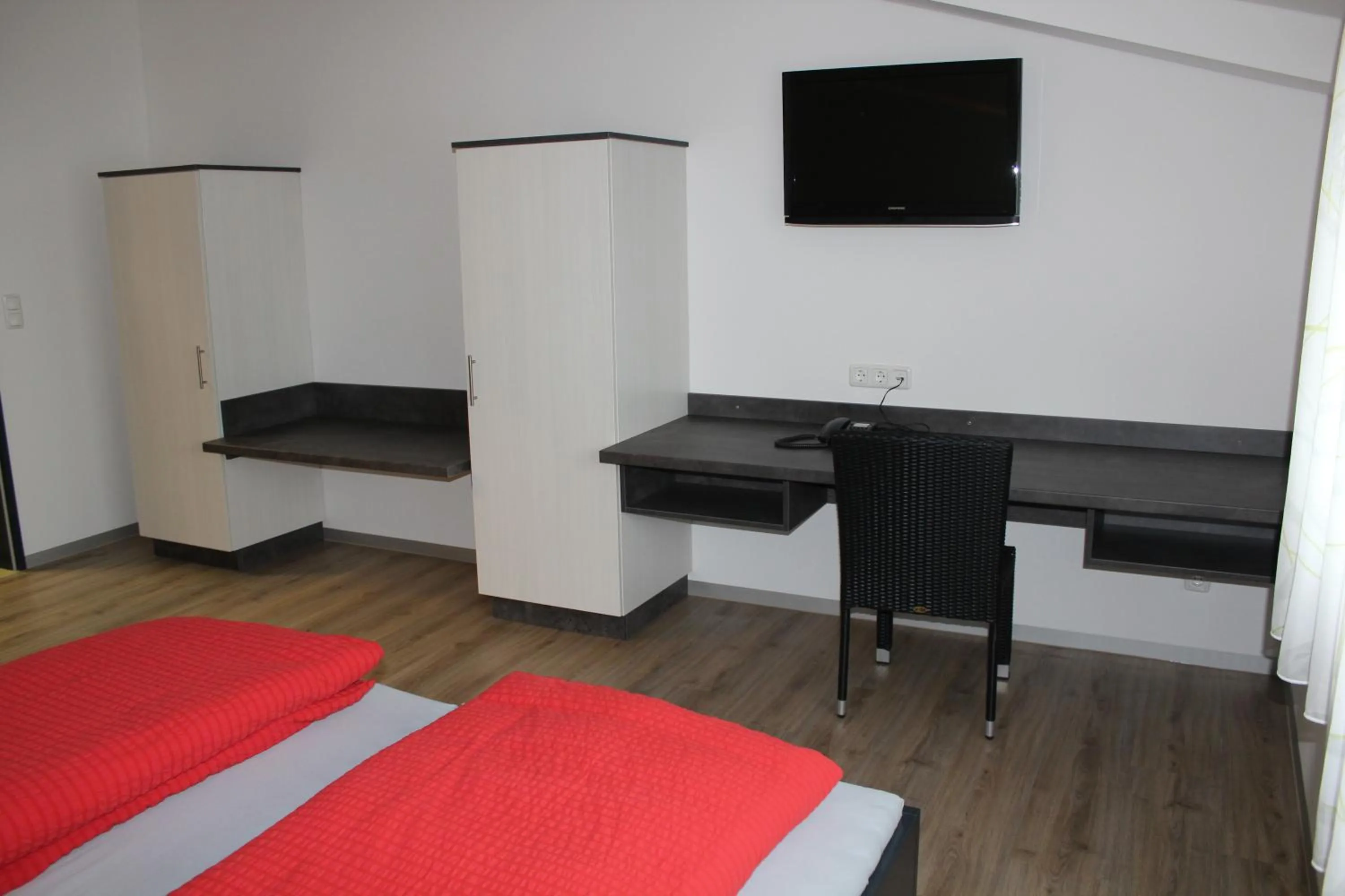 Photo of the whole room, Bed in Helmers Gästehaus