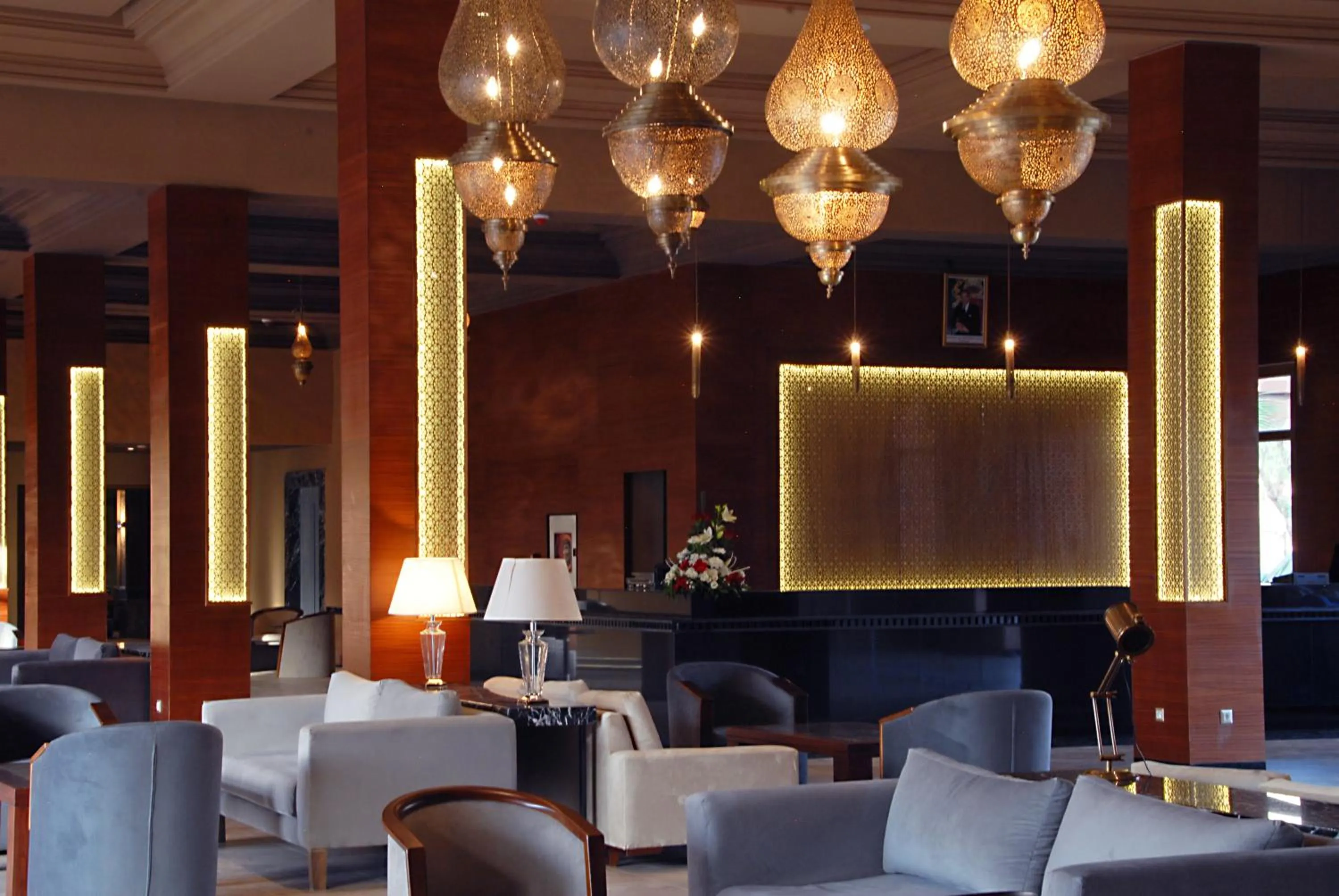 Communal lounge/ TV room in Oasis Palm Hotel