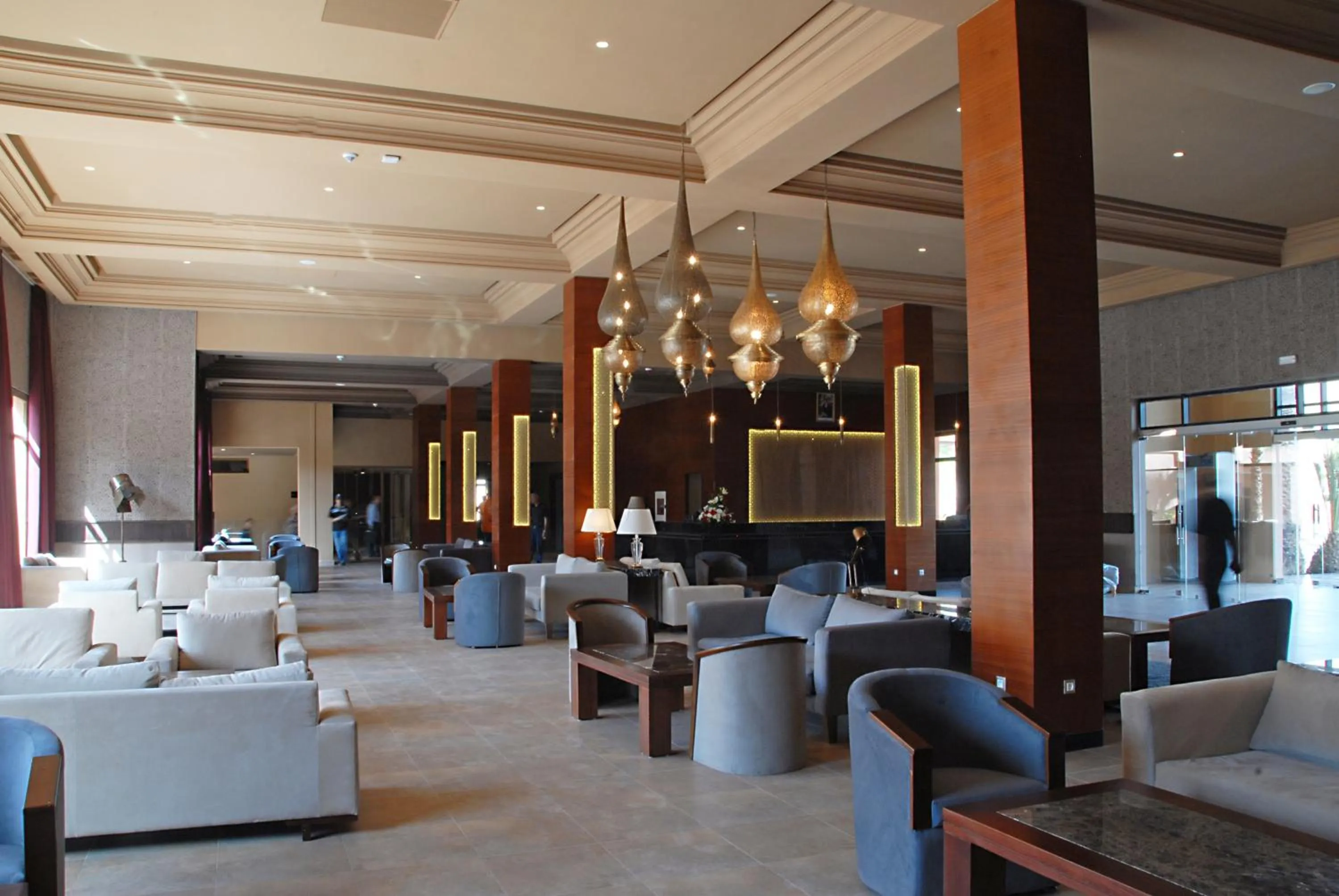 Communal lounge/ TV room in Oasis Palm Hotel