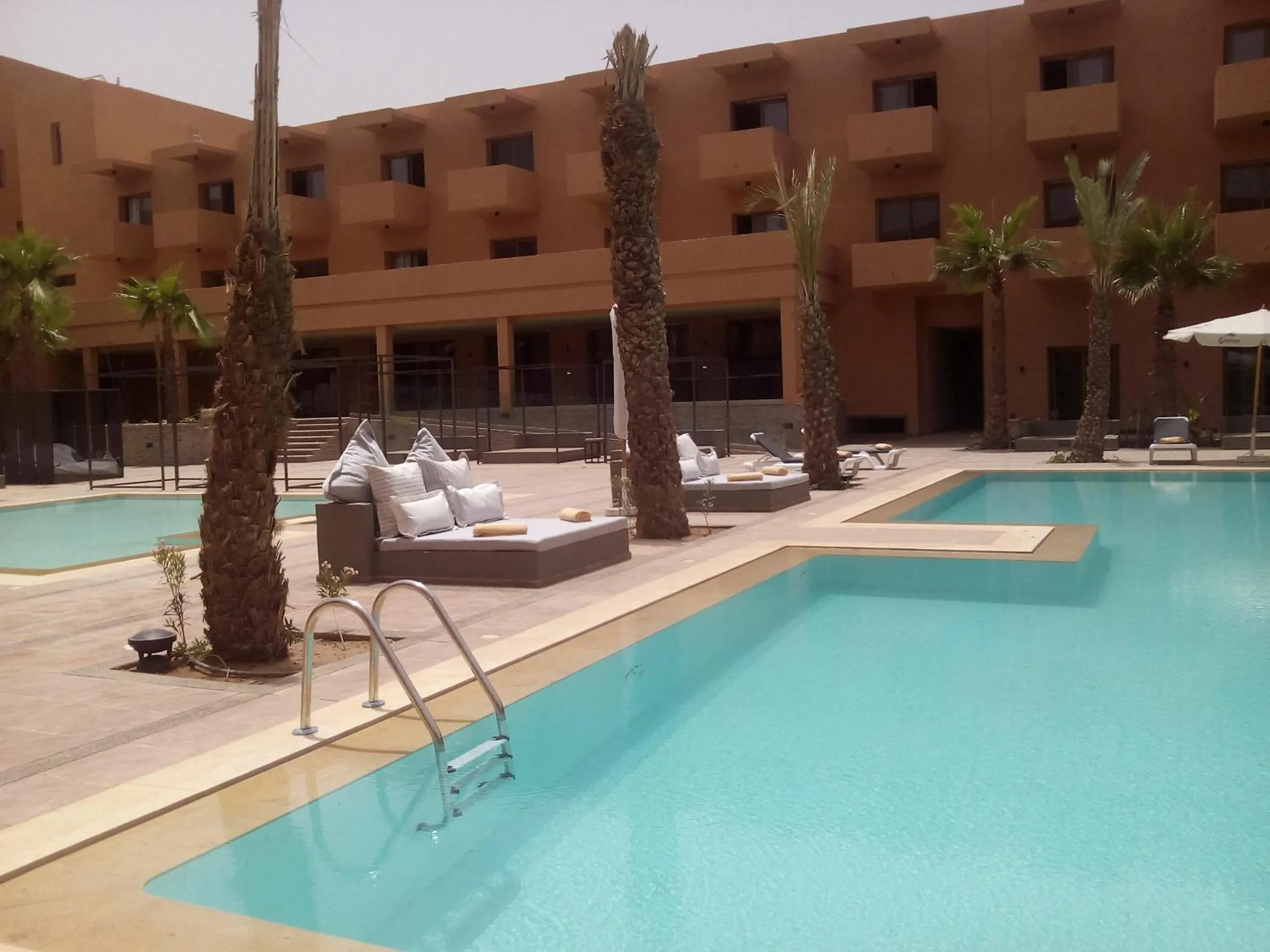 Swimming pool in Oasis Palm Hotel
