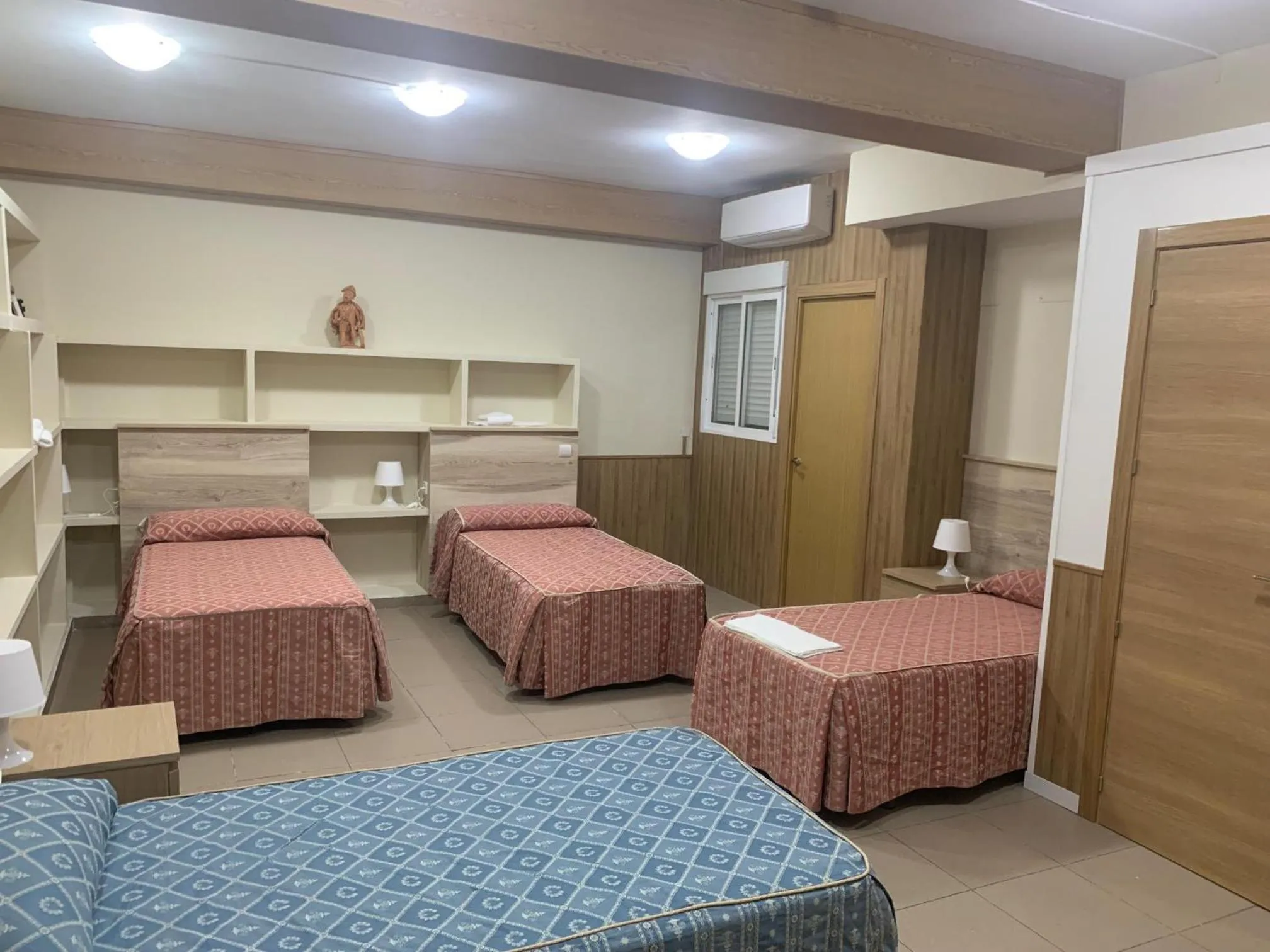 Bed in Hostal Juan XXIII