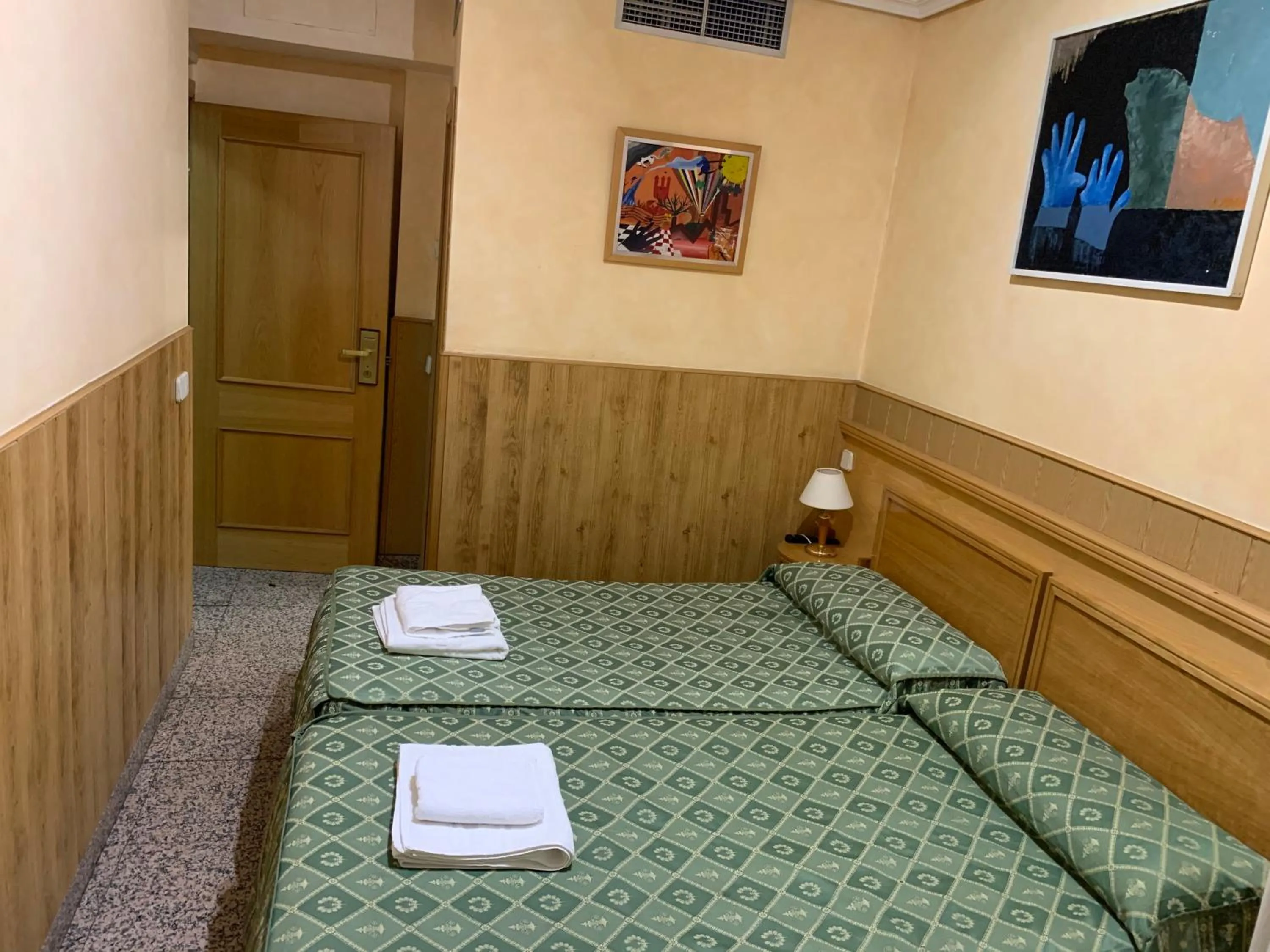 Bed in Hostal Juan XXIII