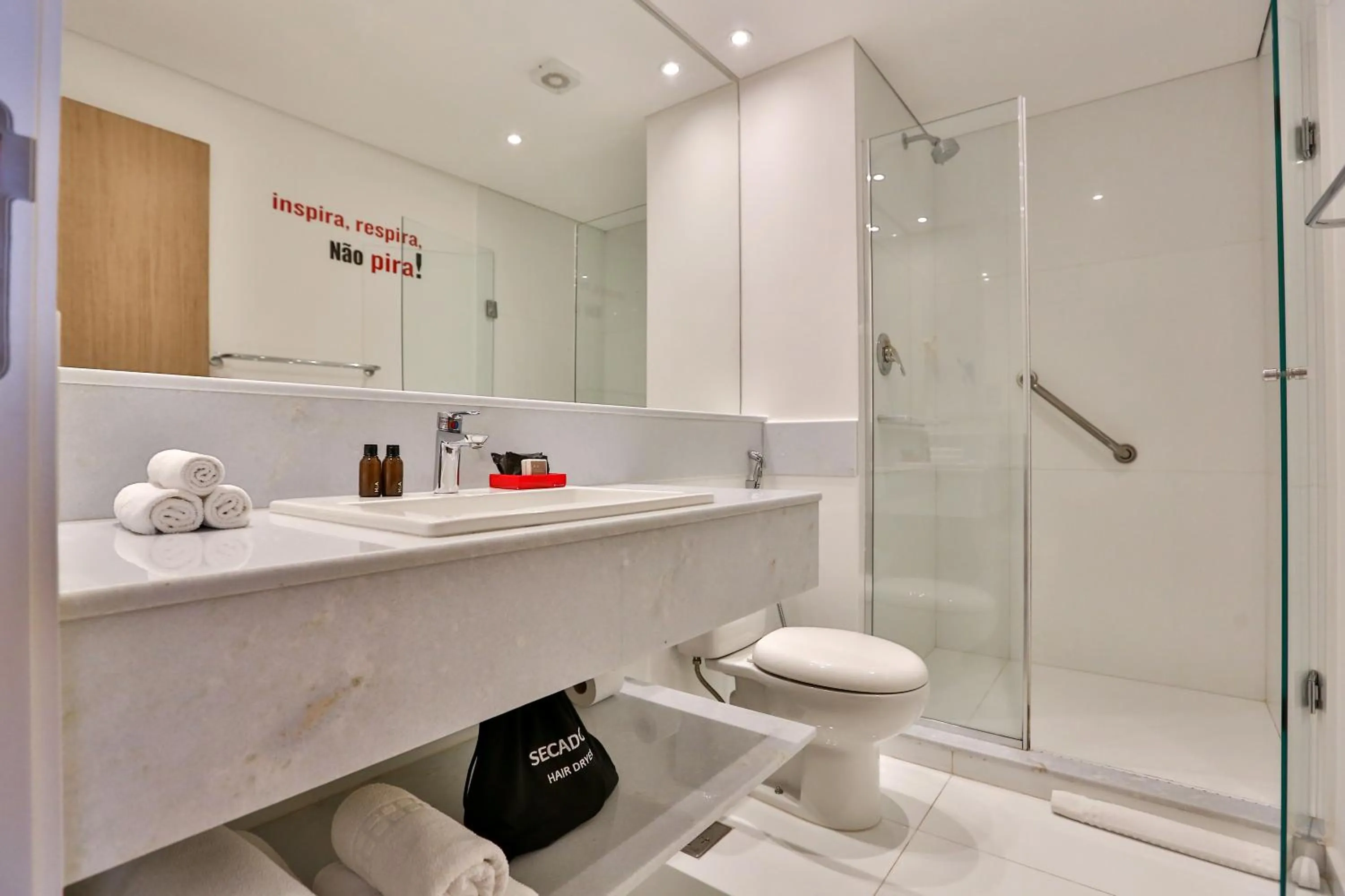 Toilet in Radisson RED Campinas