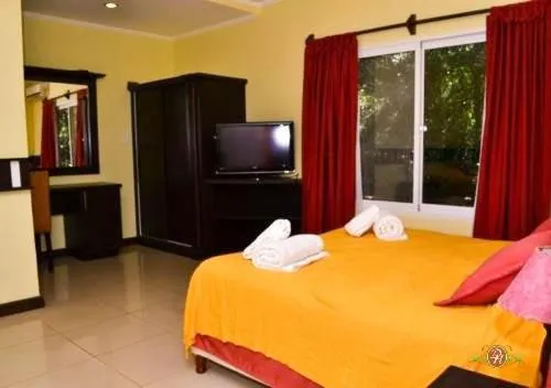 Communal lounge/ TV room, Bed in Hotel Don Horacio