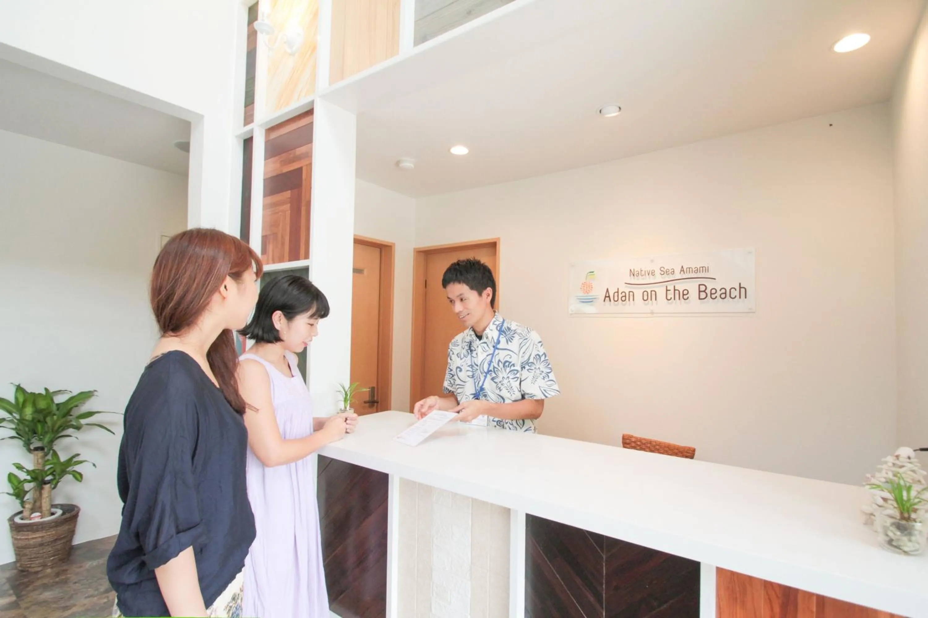 Staff in Native Sea Amami Adan On The Beach