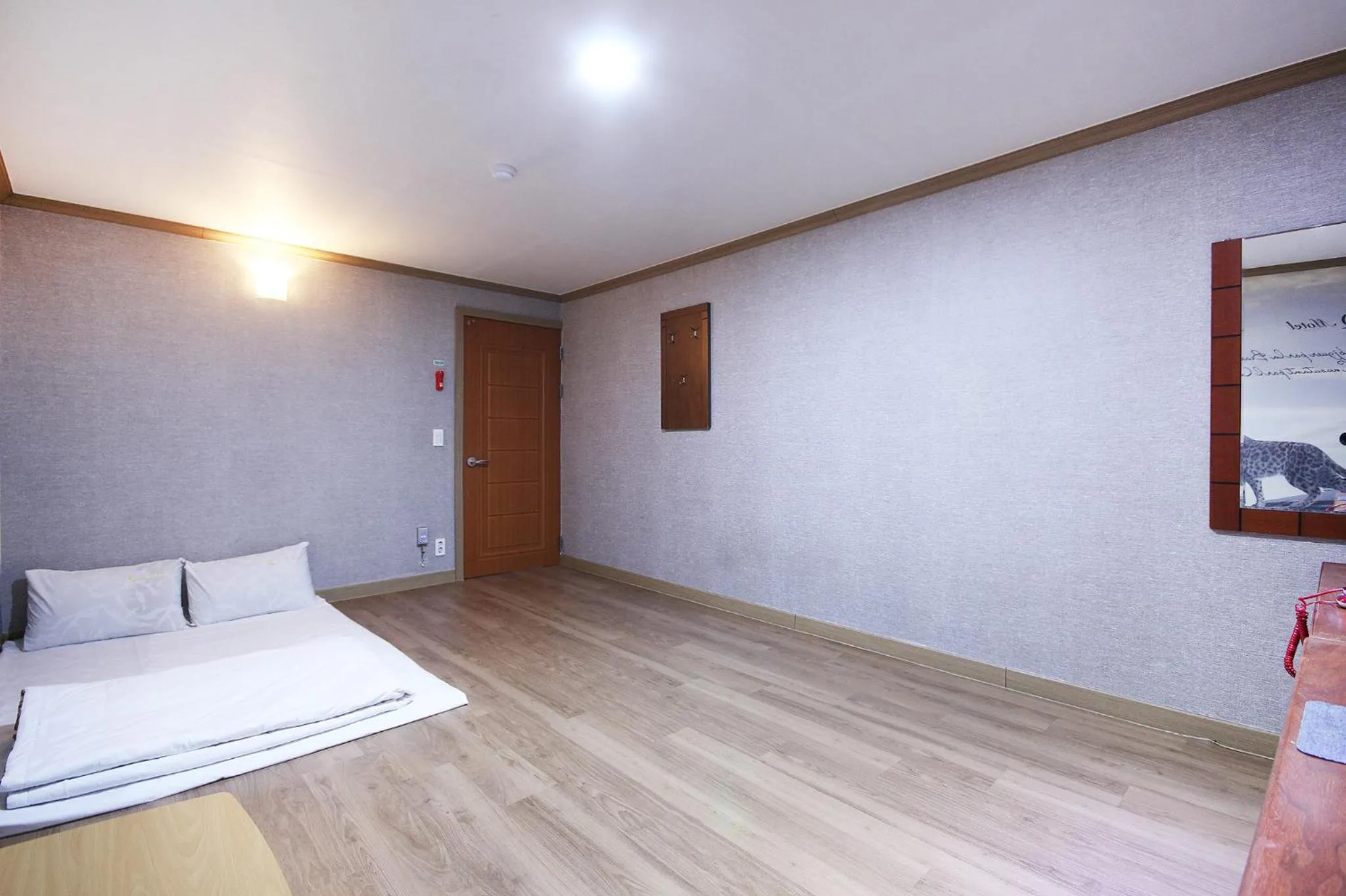 Bed in Happy Q Motel