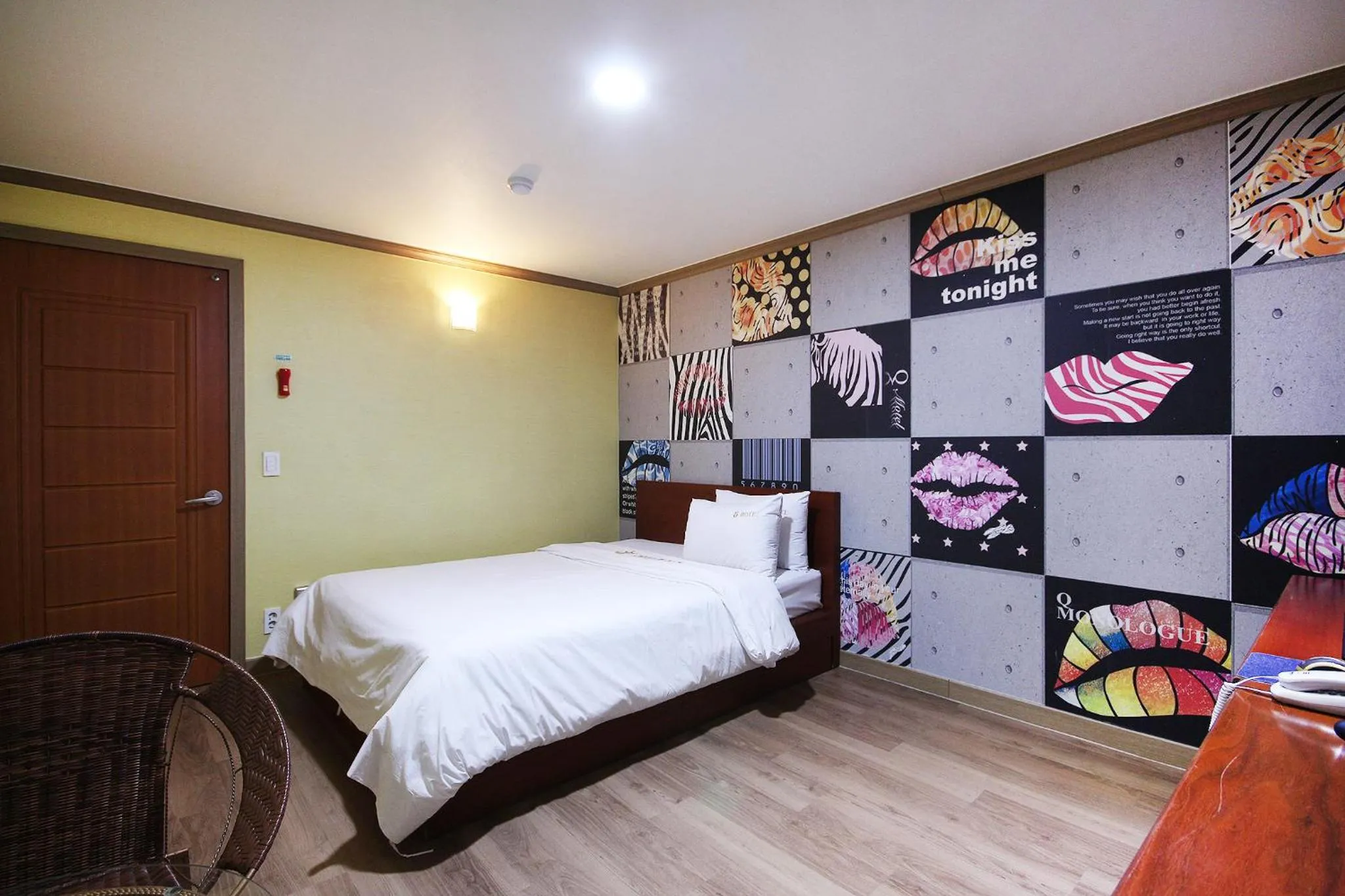 Bed in Happy Q Motel