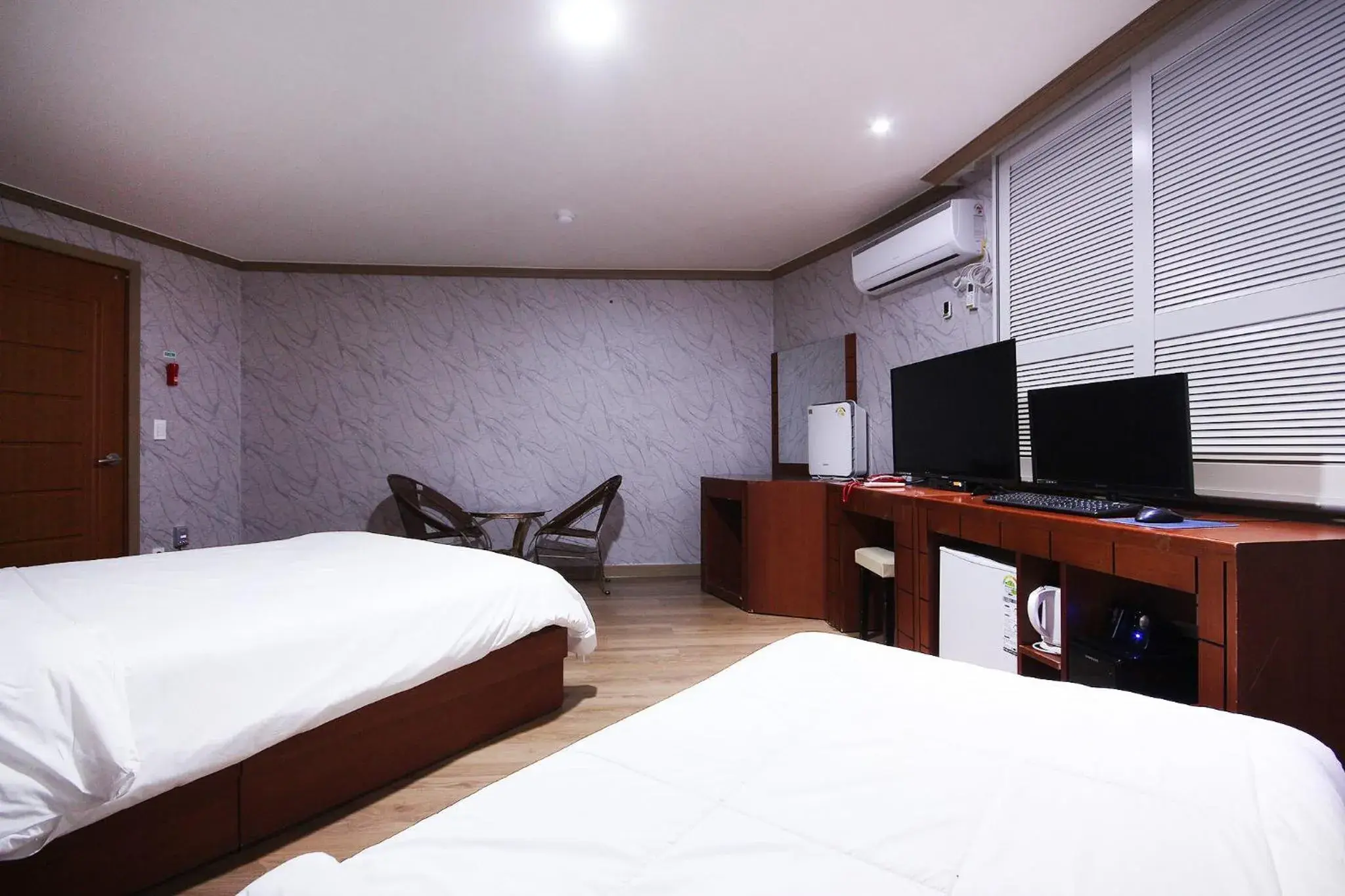 Standard Triple Room in Happy Q Motel Standard Triple Room in Happy Q Motel