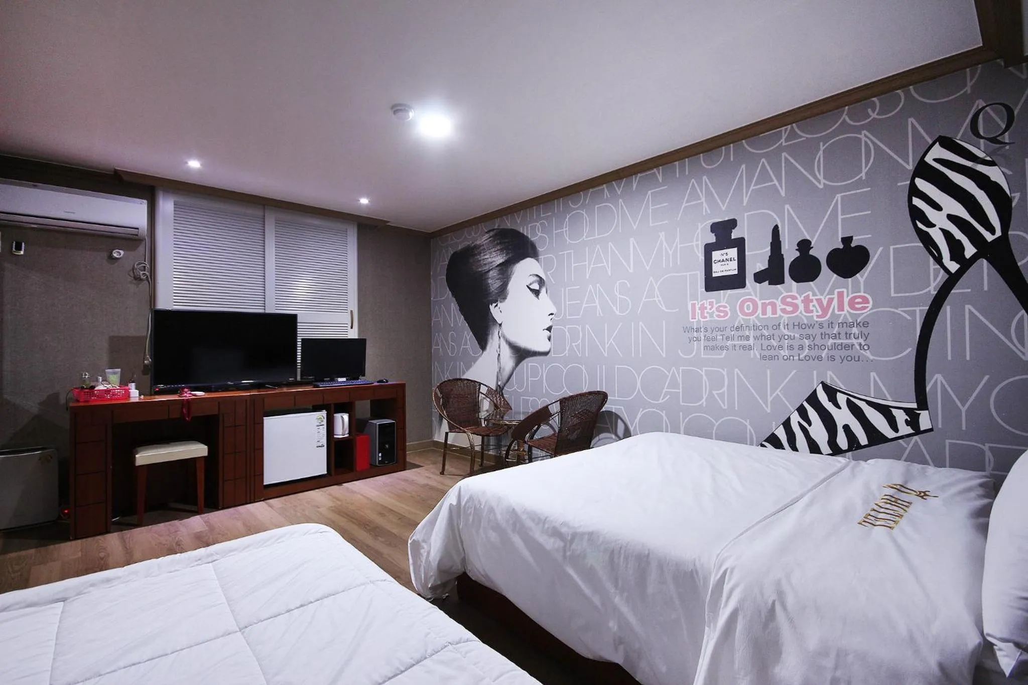 Bed in Happy Q Motel