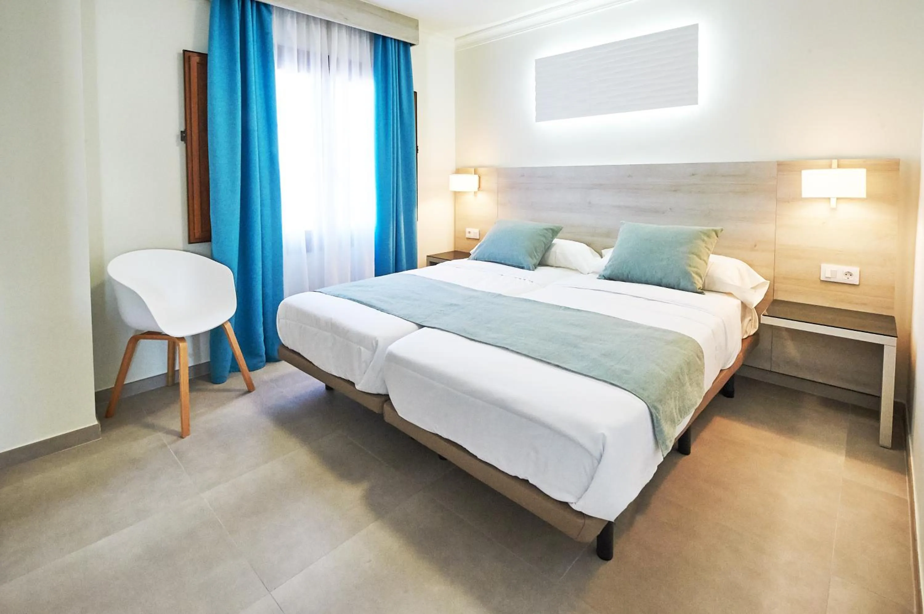 Bed in Suite Hotel Montana Club