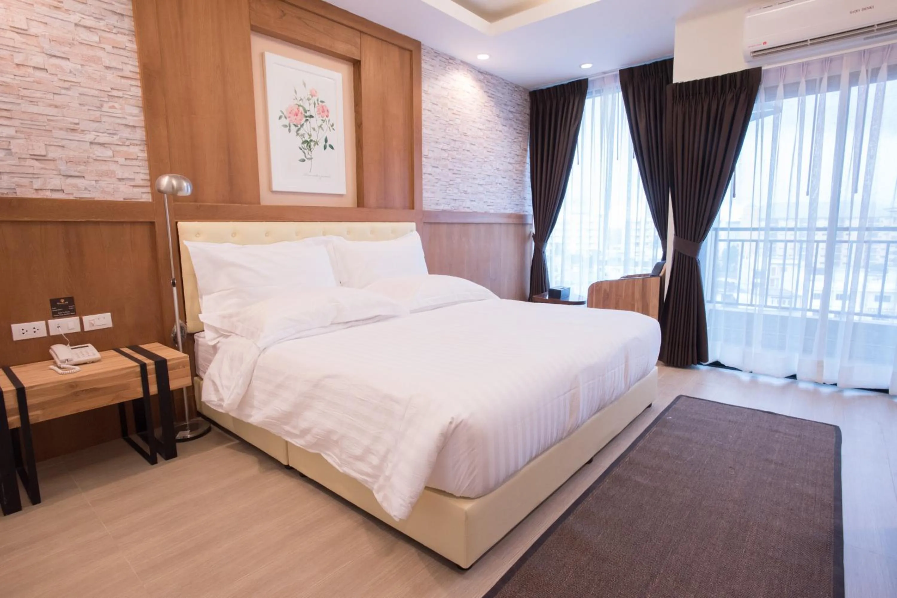 Bed in Triple B Boutique Residence