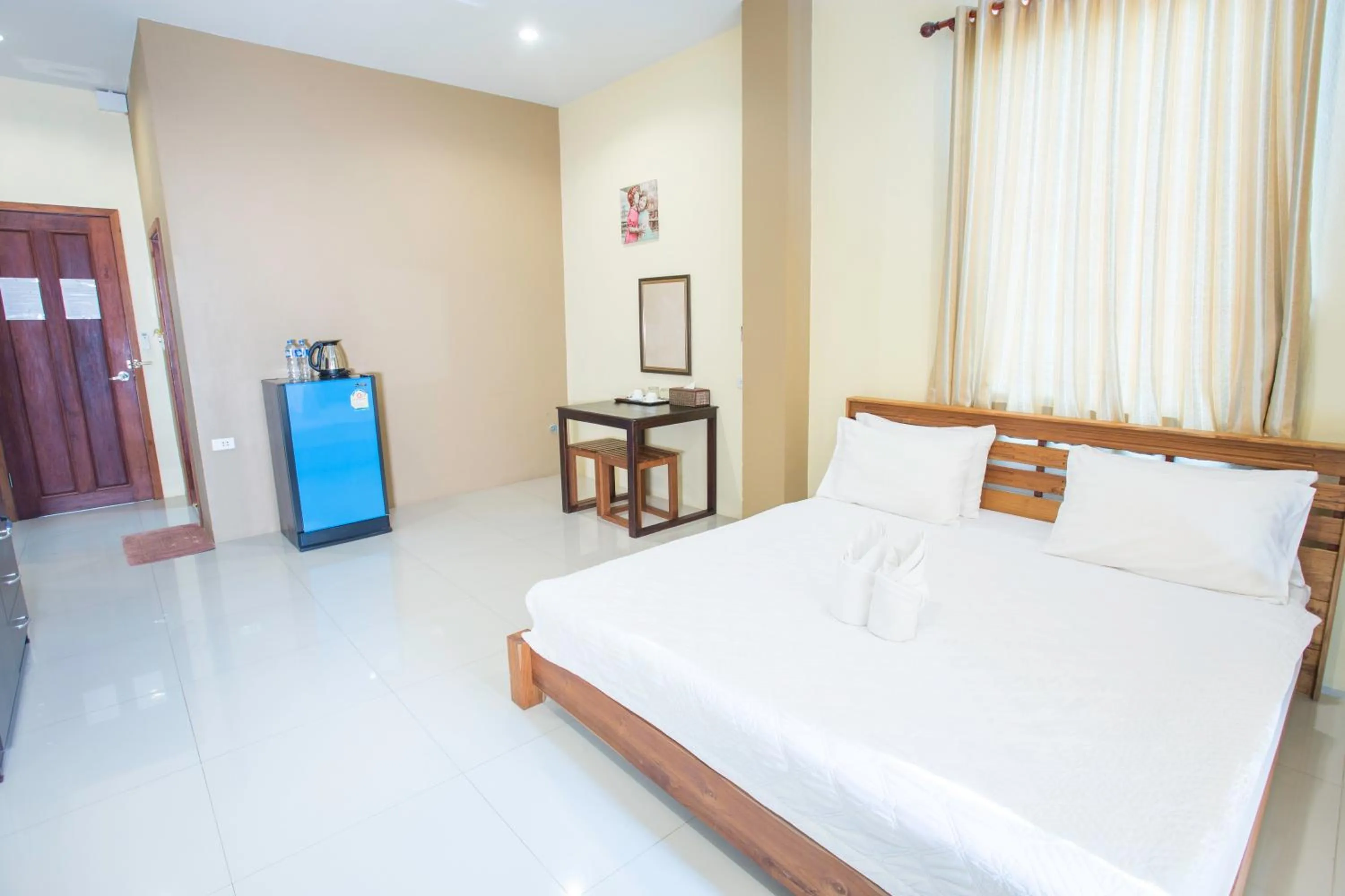 Photo of the whole room, Bed in Aura Residence