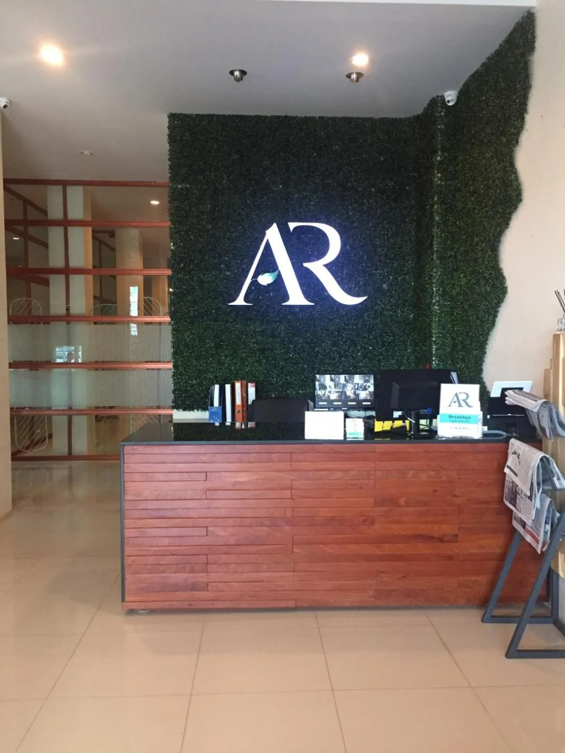 Property logo or sign in Aura Residence