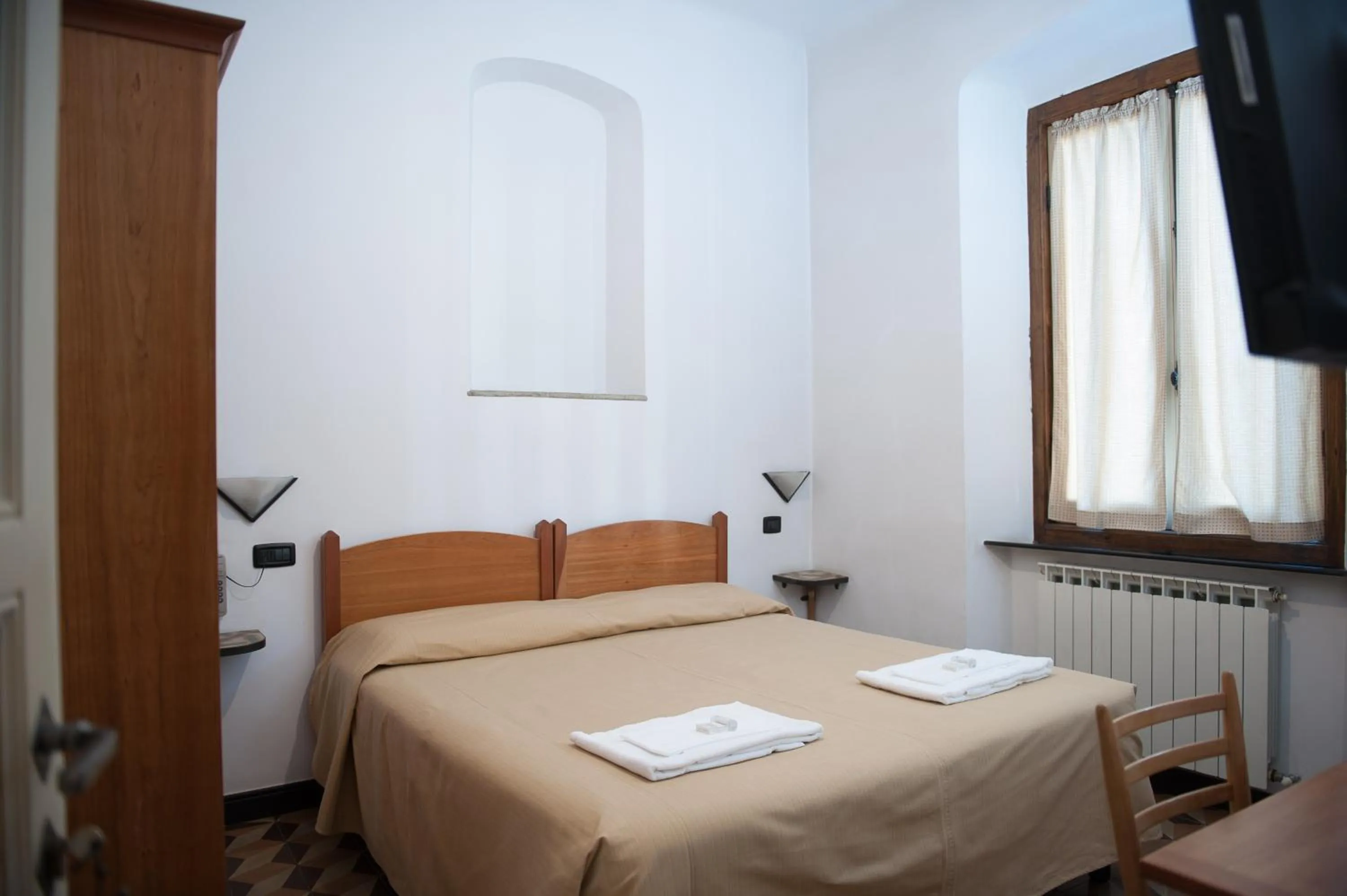 Bedroom in Albergo Vittoria
