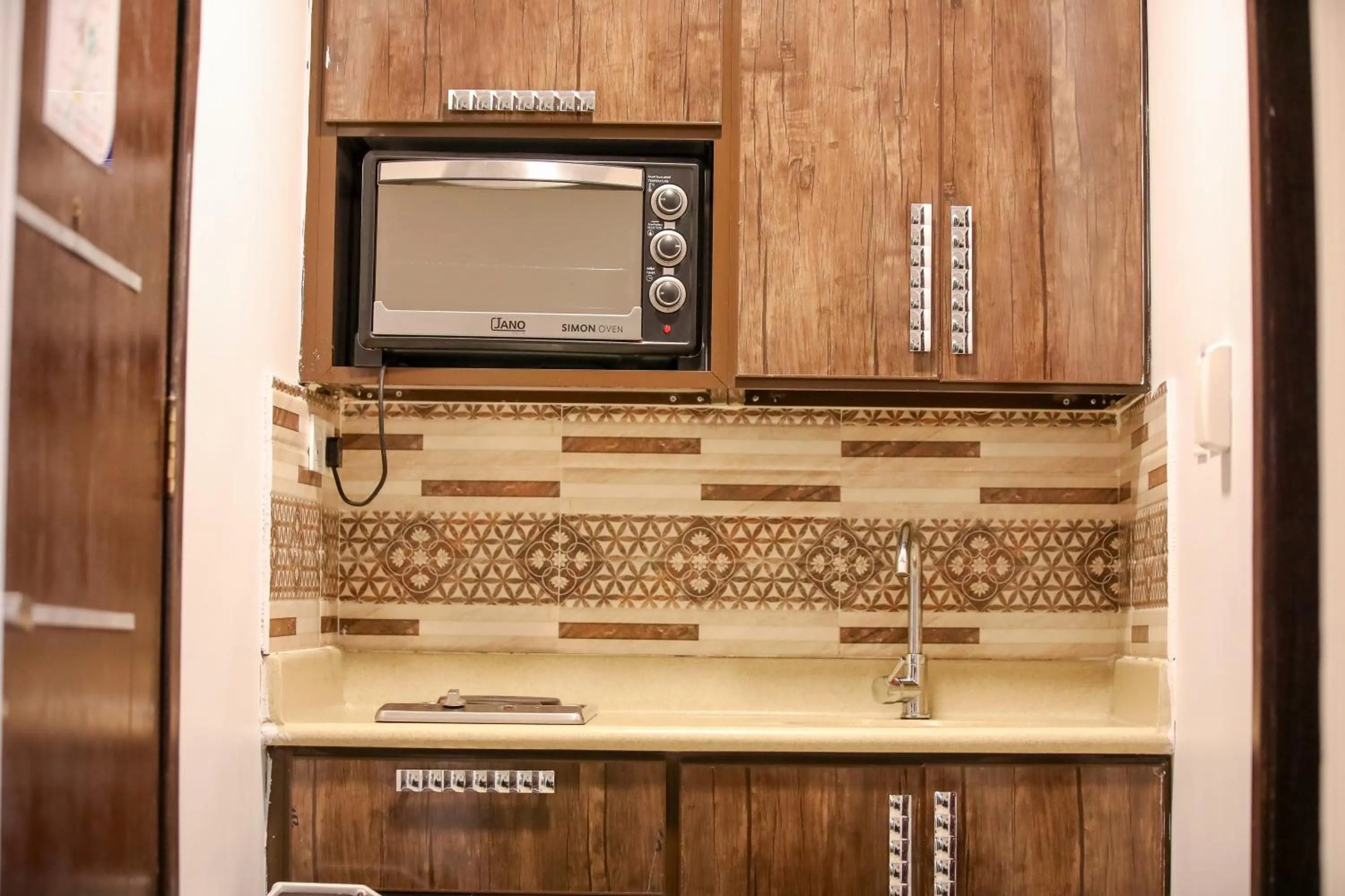 Kitchen or kitchenette in شقق ارين البساتين
