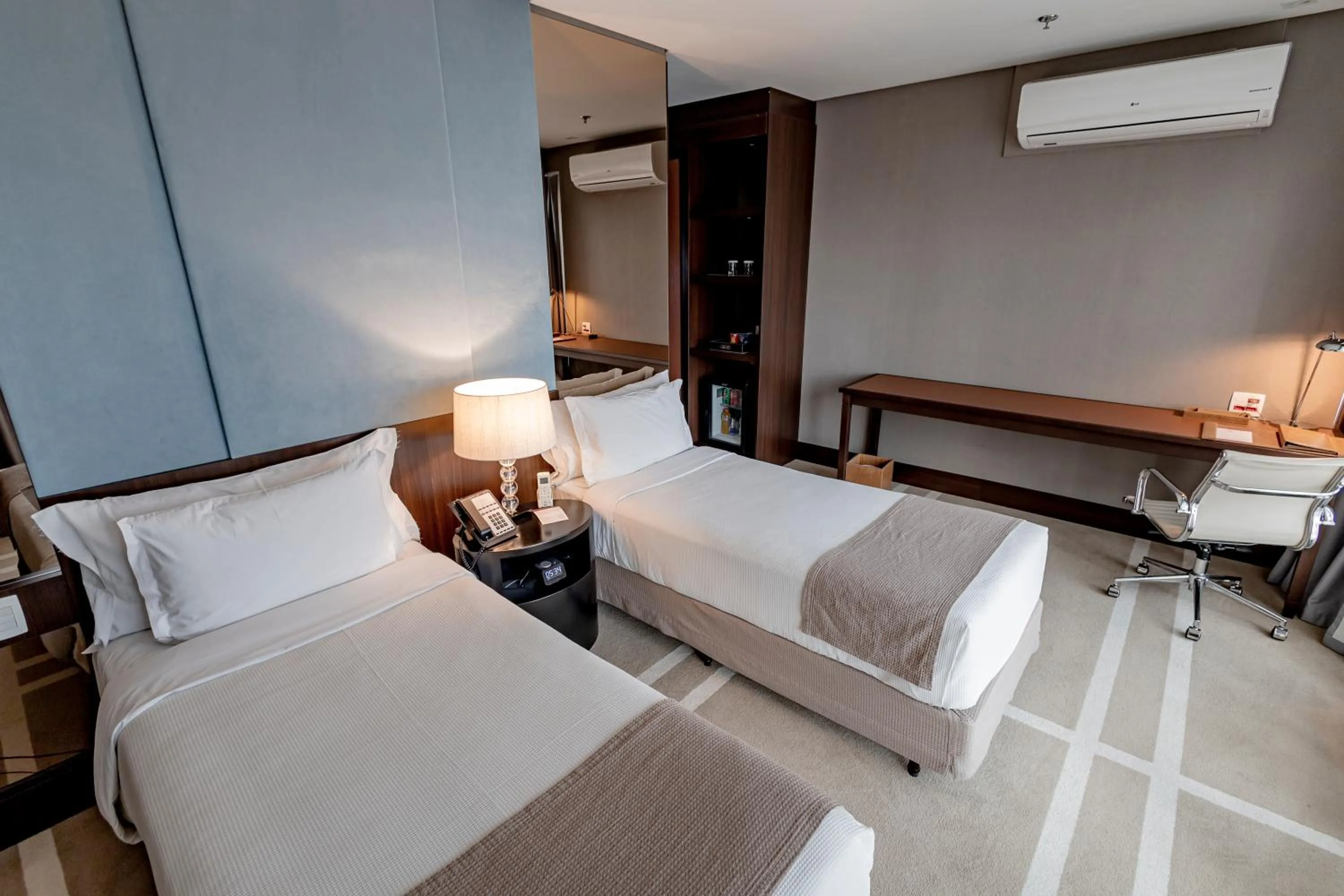 Bed in Hotel Cadoro São Paulo