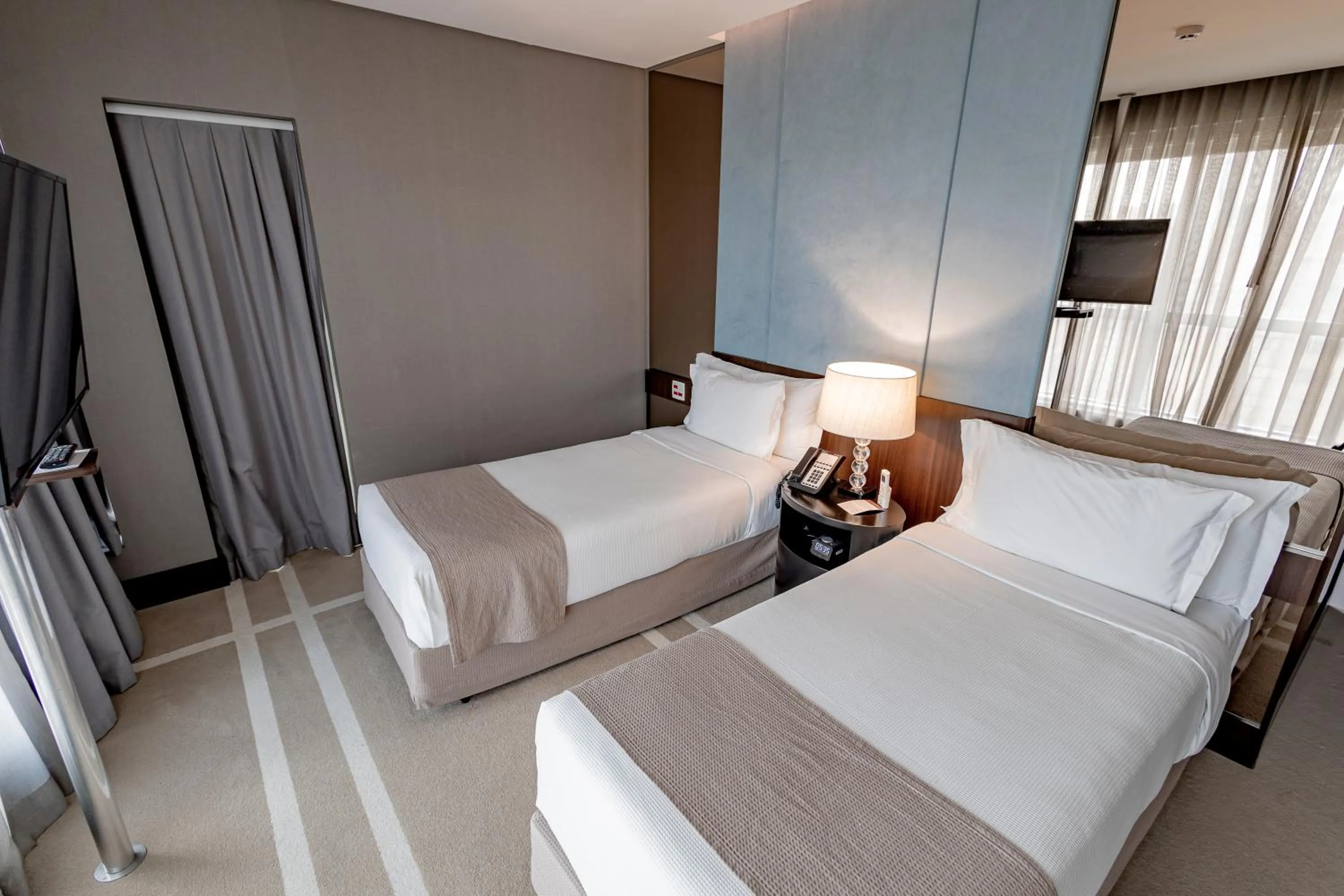 Bed in Hotel Cadoro São Paulo