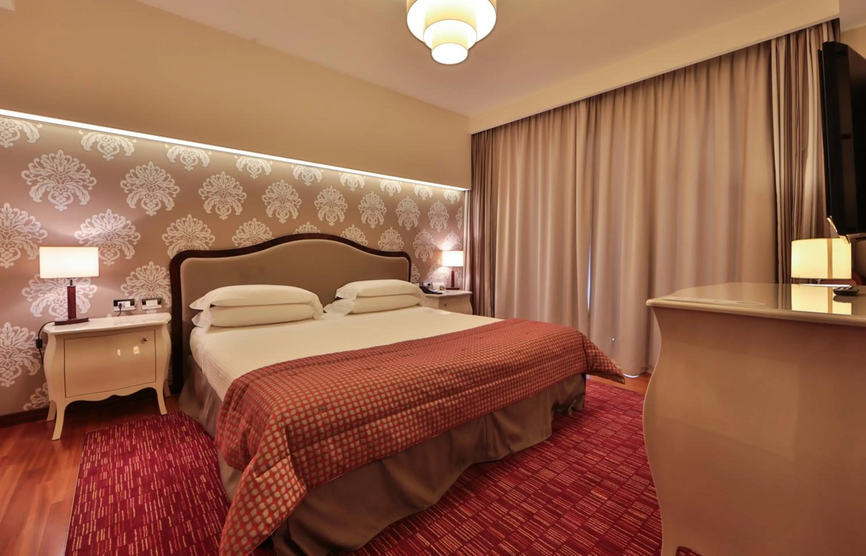 Bedroom, Bed in UNA Hotels Expo Fiera Milano