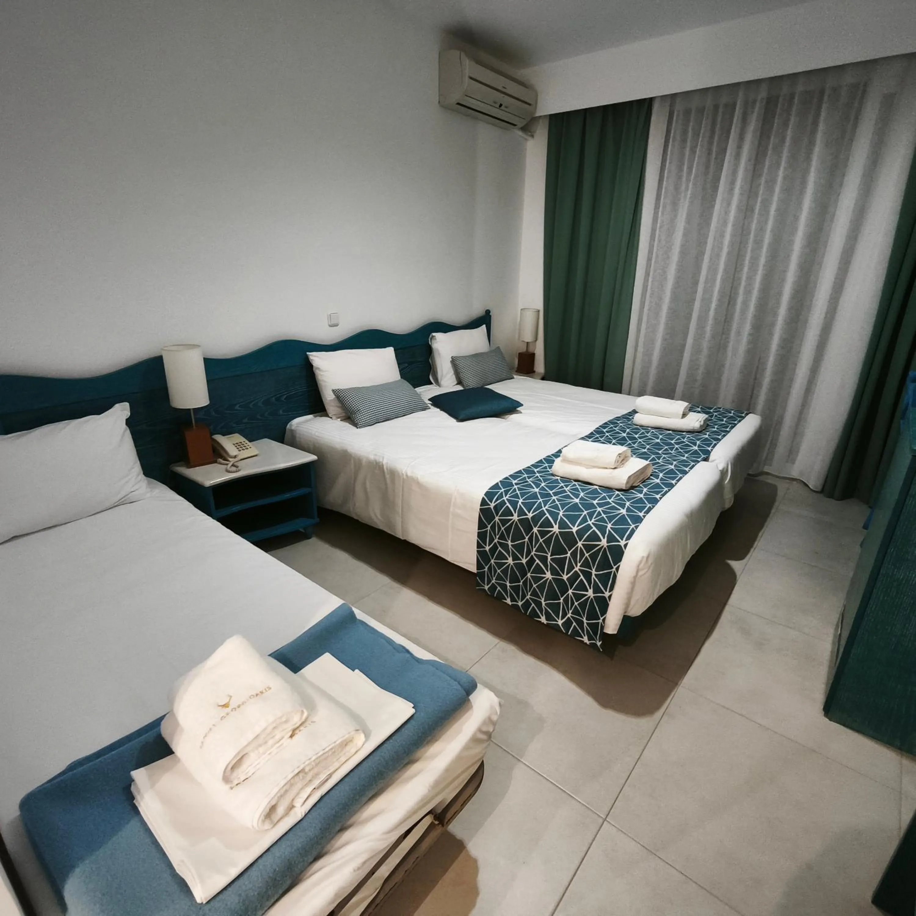 Bed in Knossos Hotel