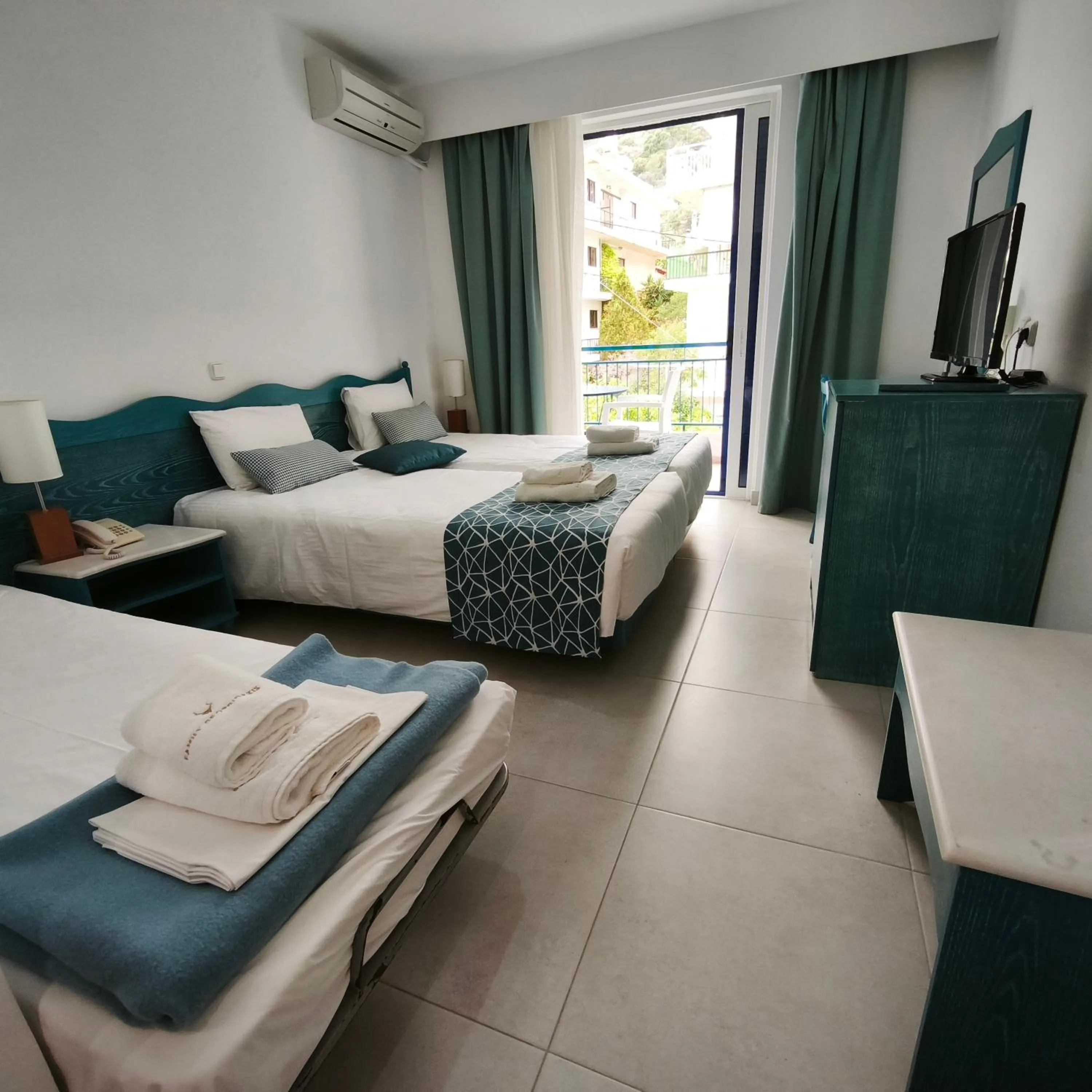 Bed in Knossos Hotel