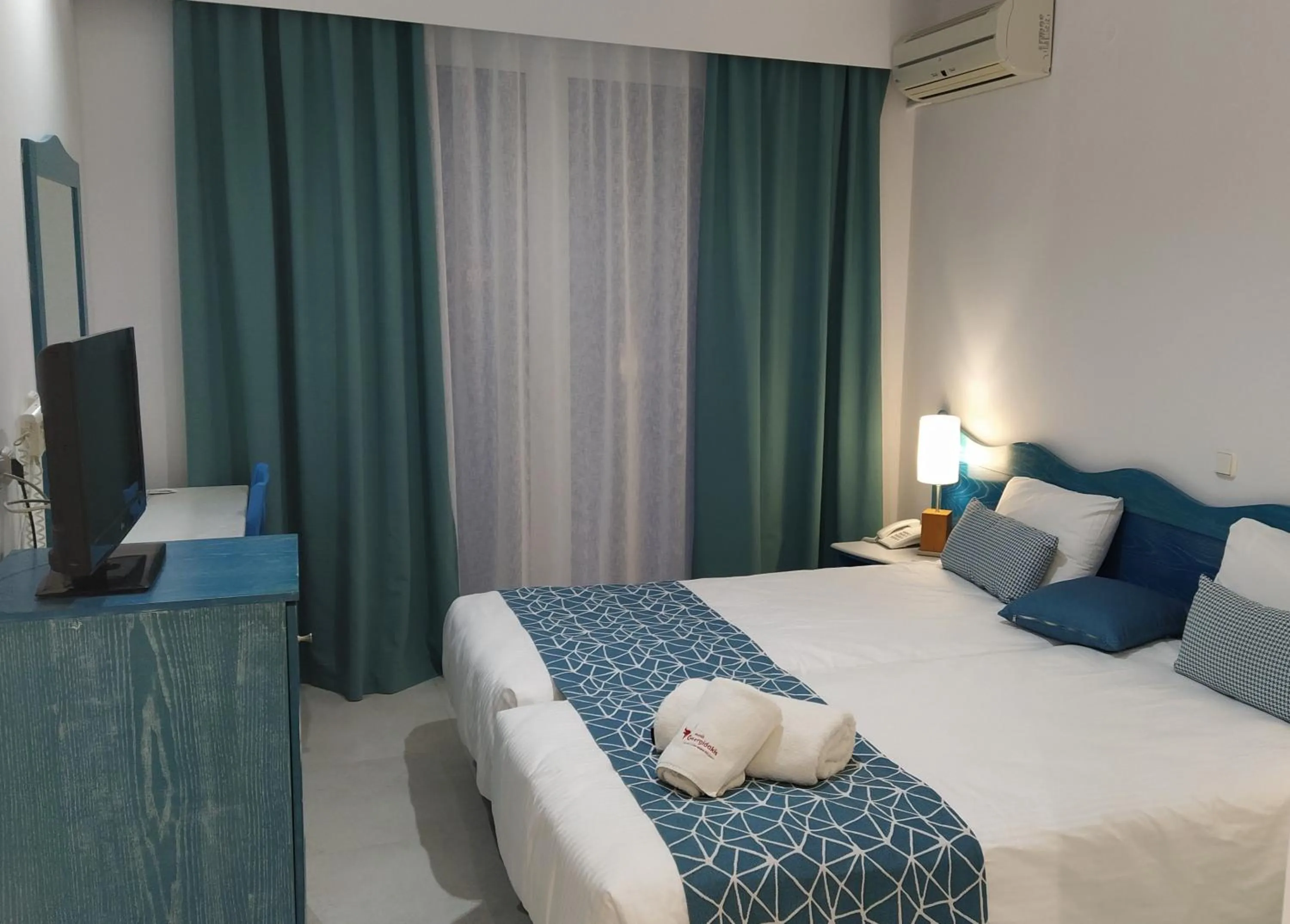 Bed in Knossos Hotel