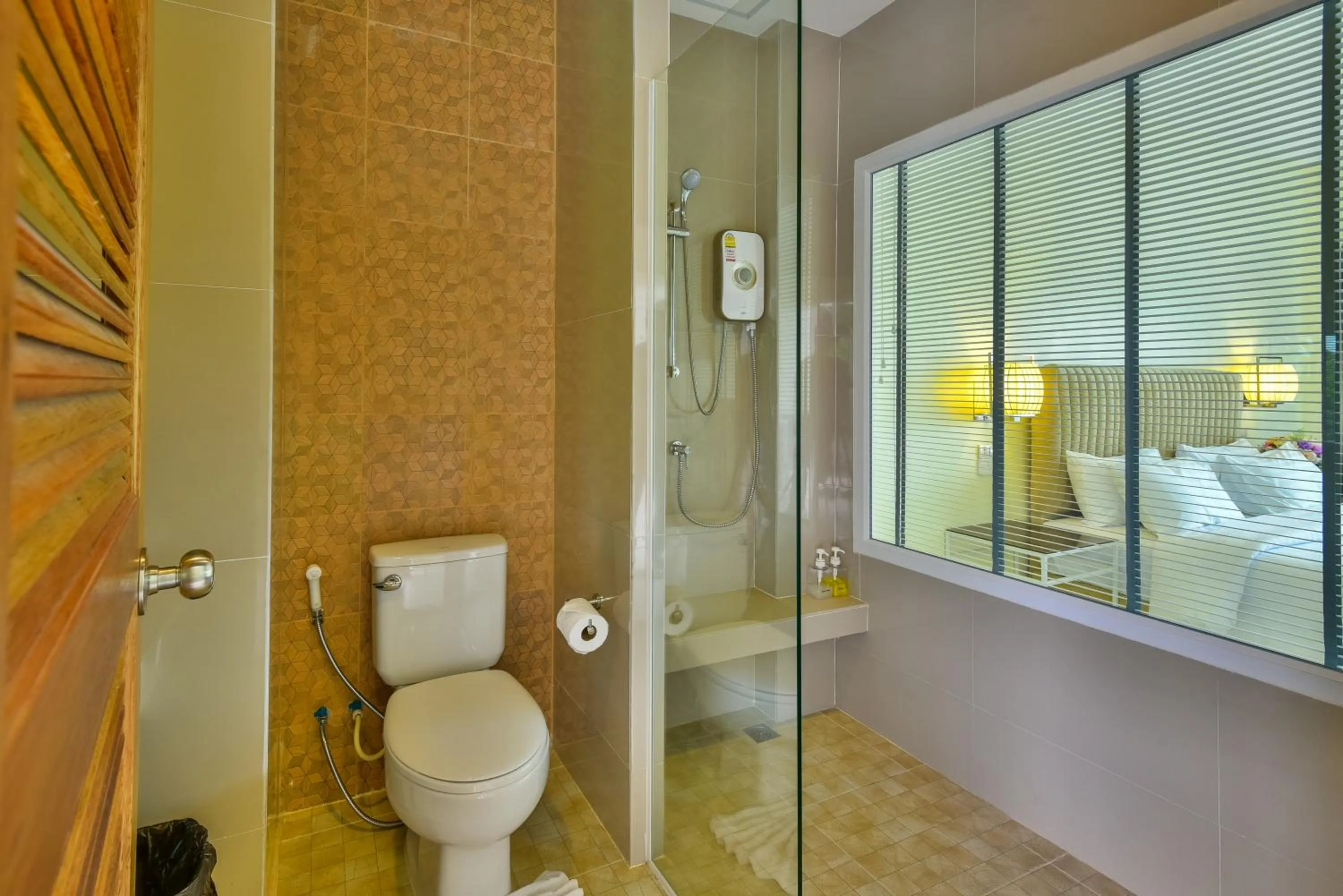 Toilet, Bed in Southgate Residence Hotel - SHA Certified