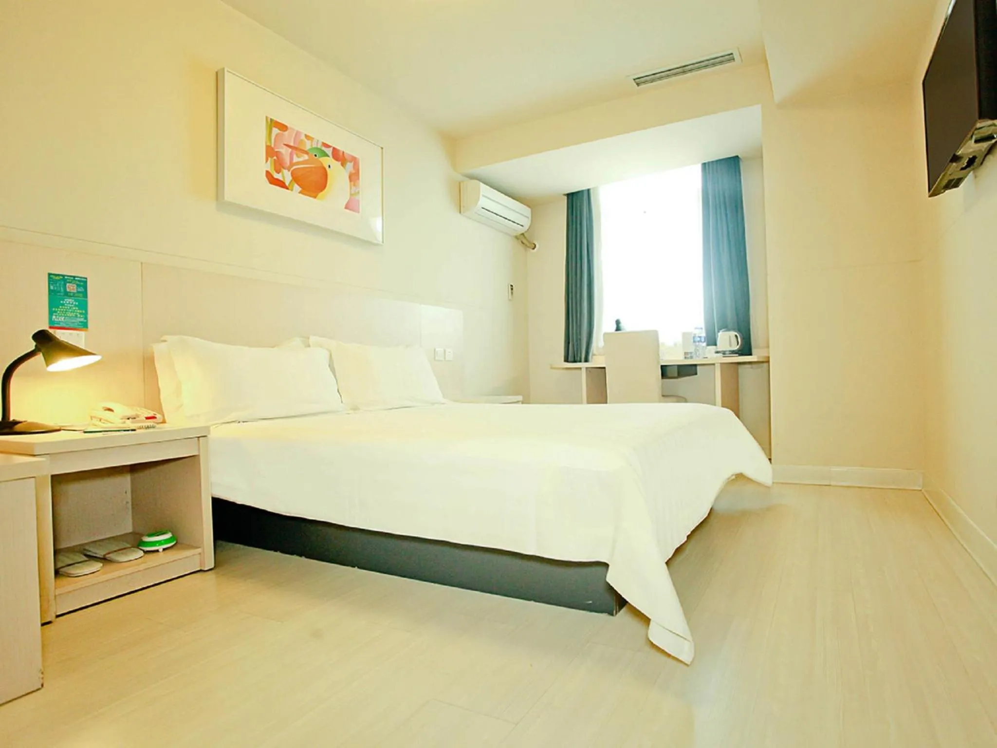 Bedroom, Bed in Jingjiang Inn Taiyuan Fuxi Street Wanda Plaza