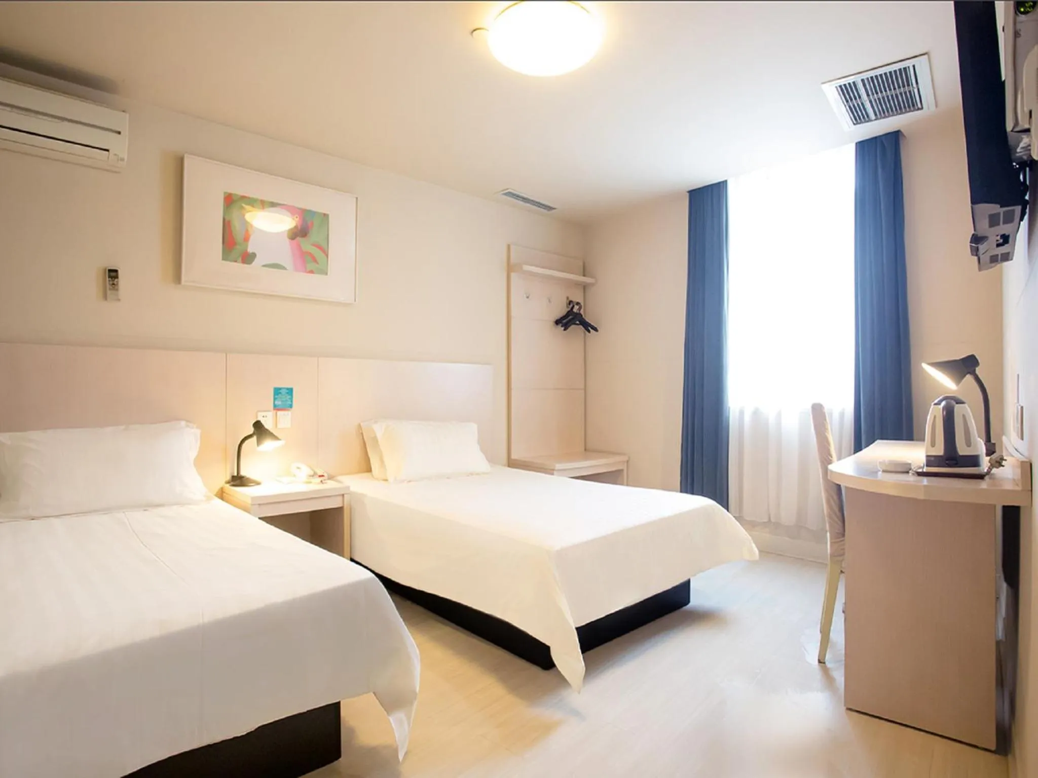 Bedroom, Bed in Jingjiang Inn Taiyuan Fuxi Street Wanda Plaza