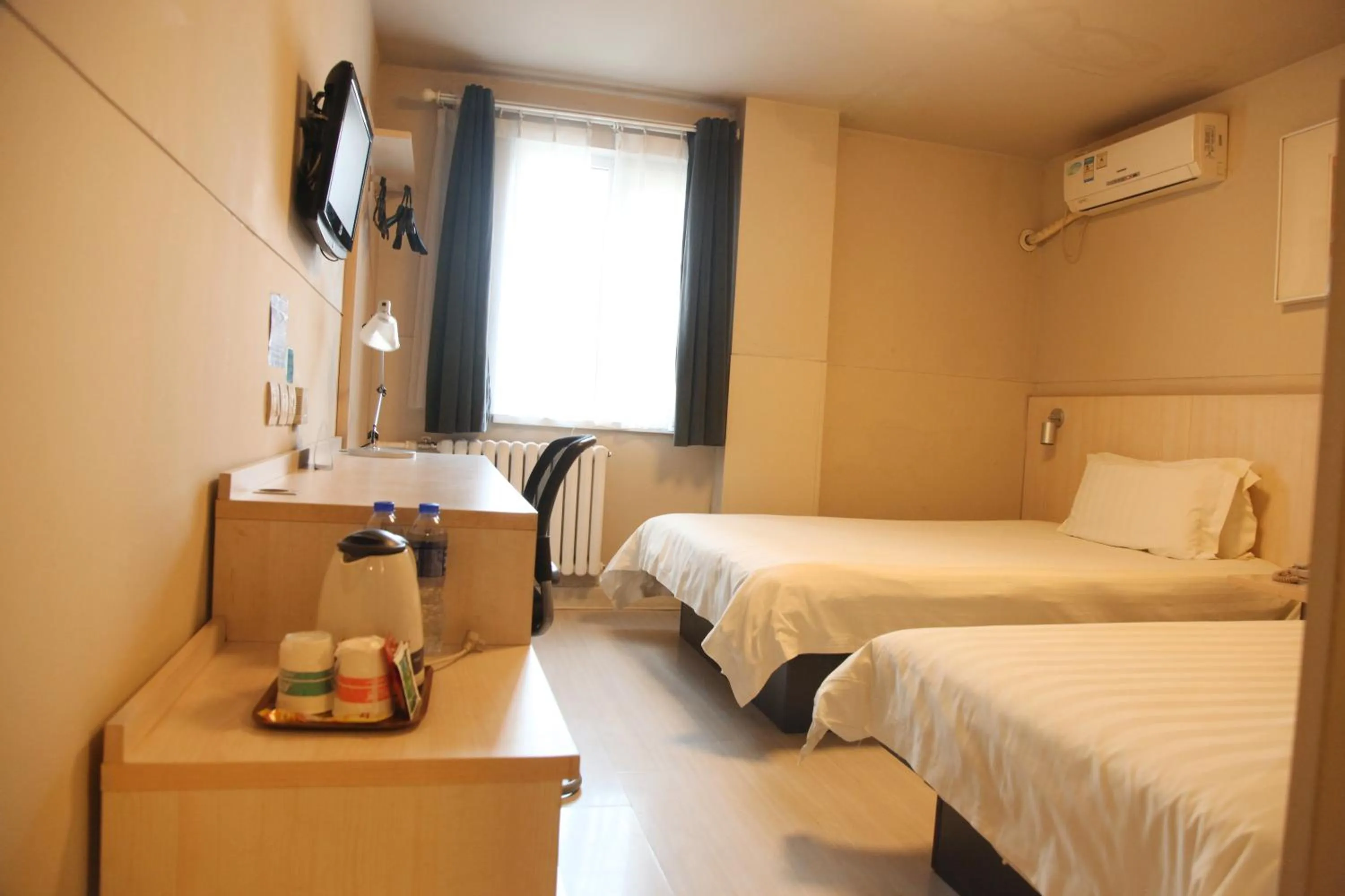 Bed in Jinjiang Inn Beijing Zoo