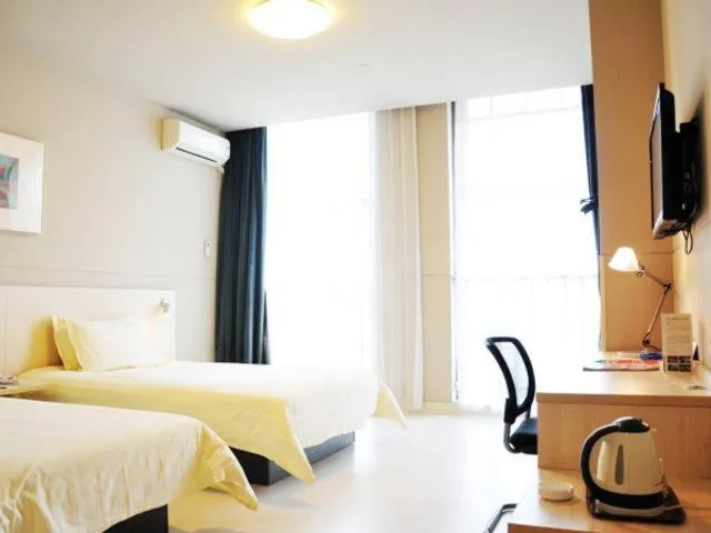 Bed in Jinjiang Inn Suzhou Wuzhong Wanda Plaza Canglang New Estate