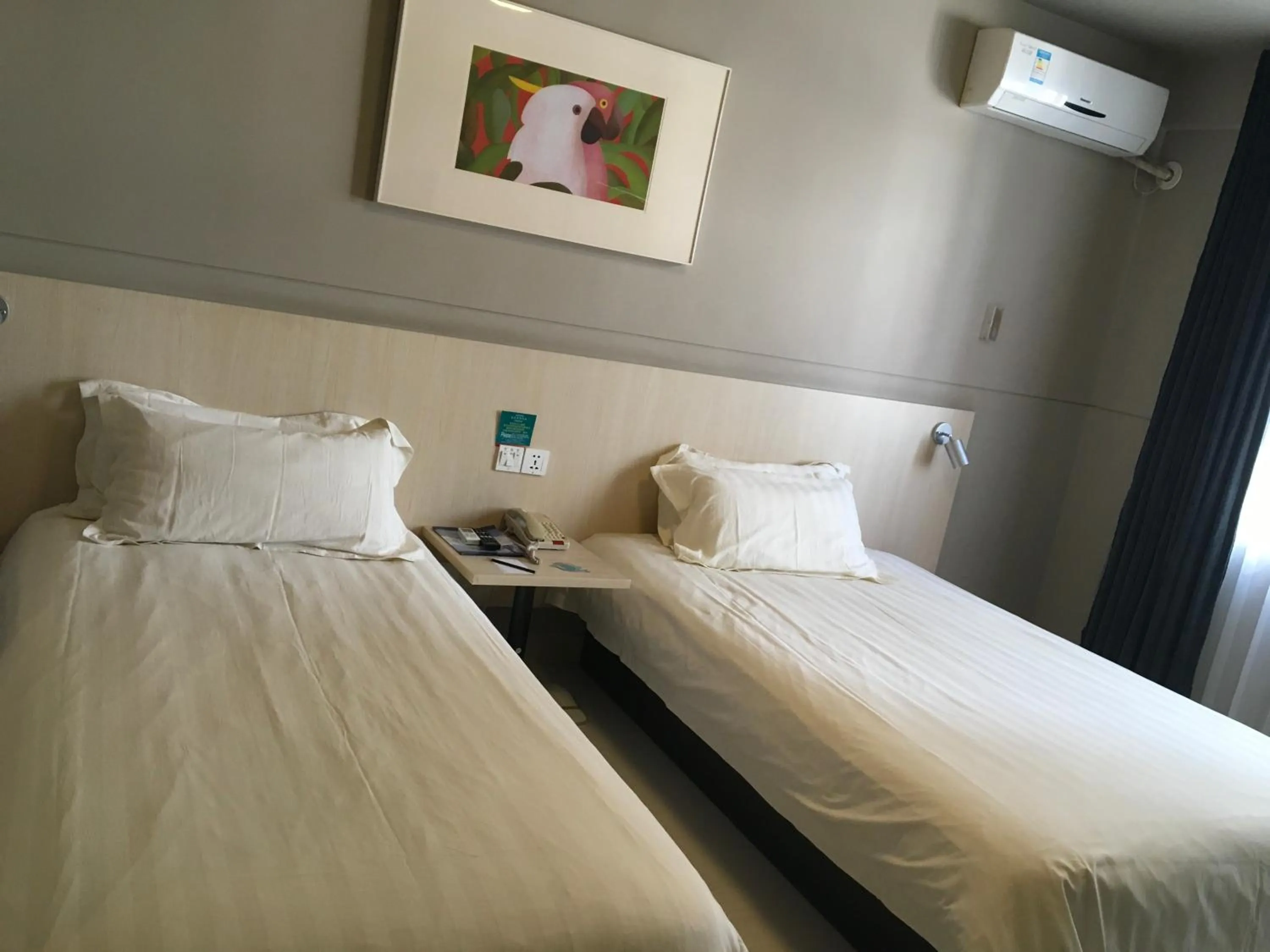 Bed in Jinjiang Inn Lijiang Ancient City Qixing Street