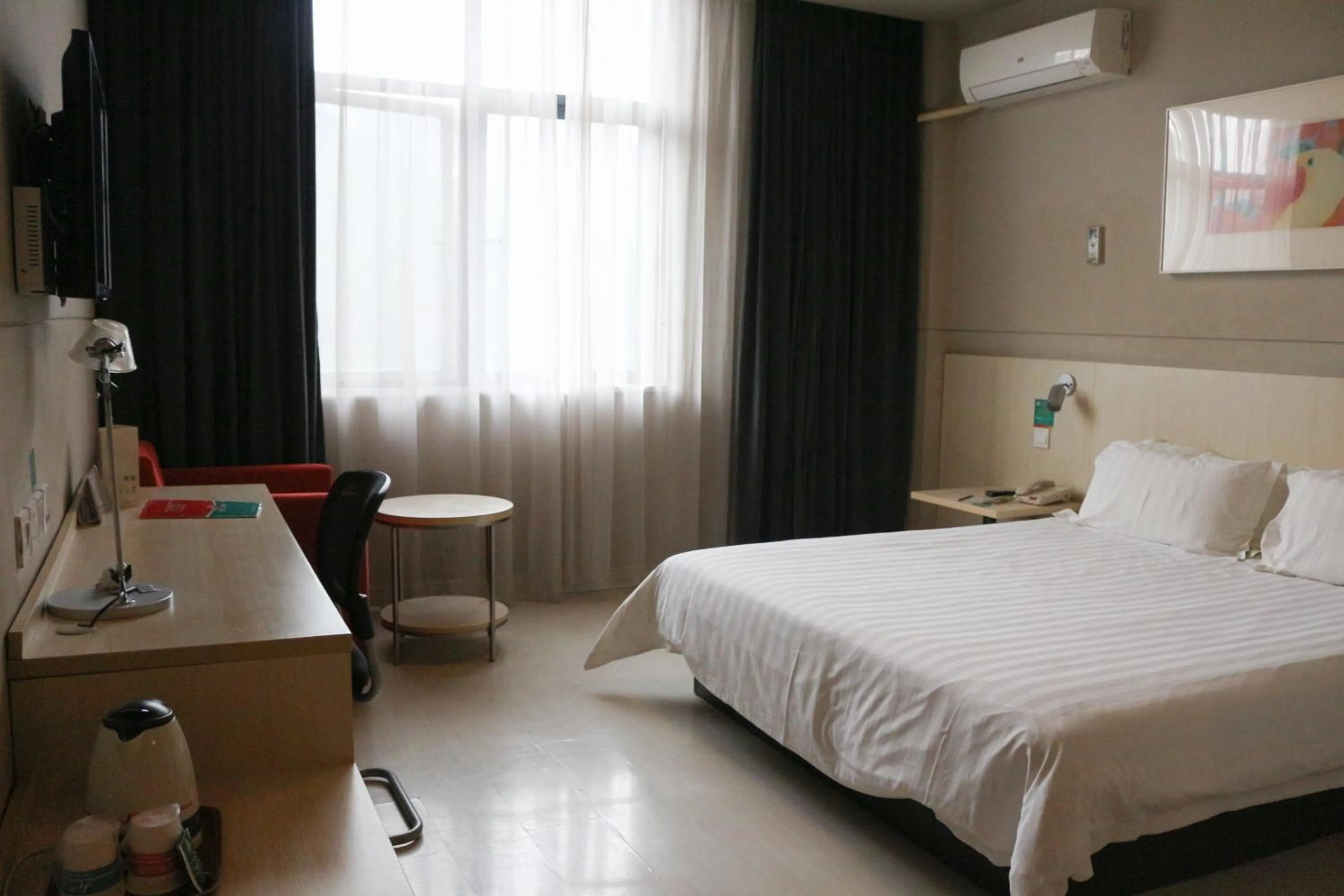 Bed in Jinjiang Inn Shanghai Chedun Studios