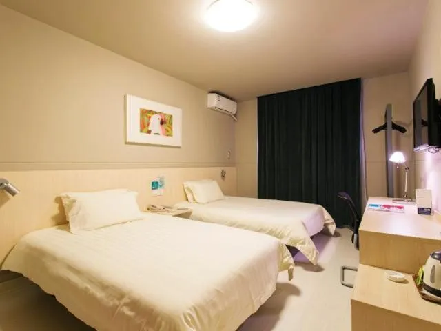 Bed in Jinjiang Inn Changsha Middle Shuguang Road National Civil Service Training Centre