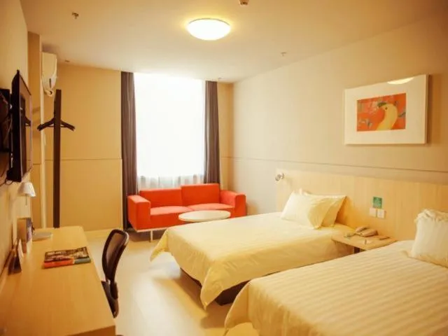 Bed in Magnolia Hotel Cangzhou West Railway Station Jiefang Road