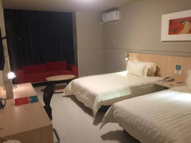 Bed in Magnolia Hotel Cangzhou West Railway Station Jiefang Road