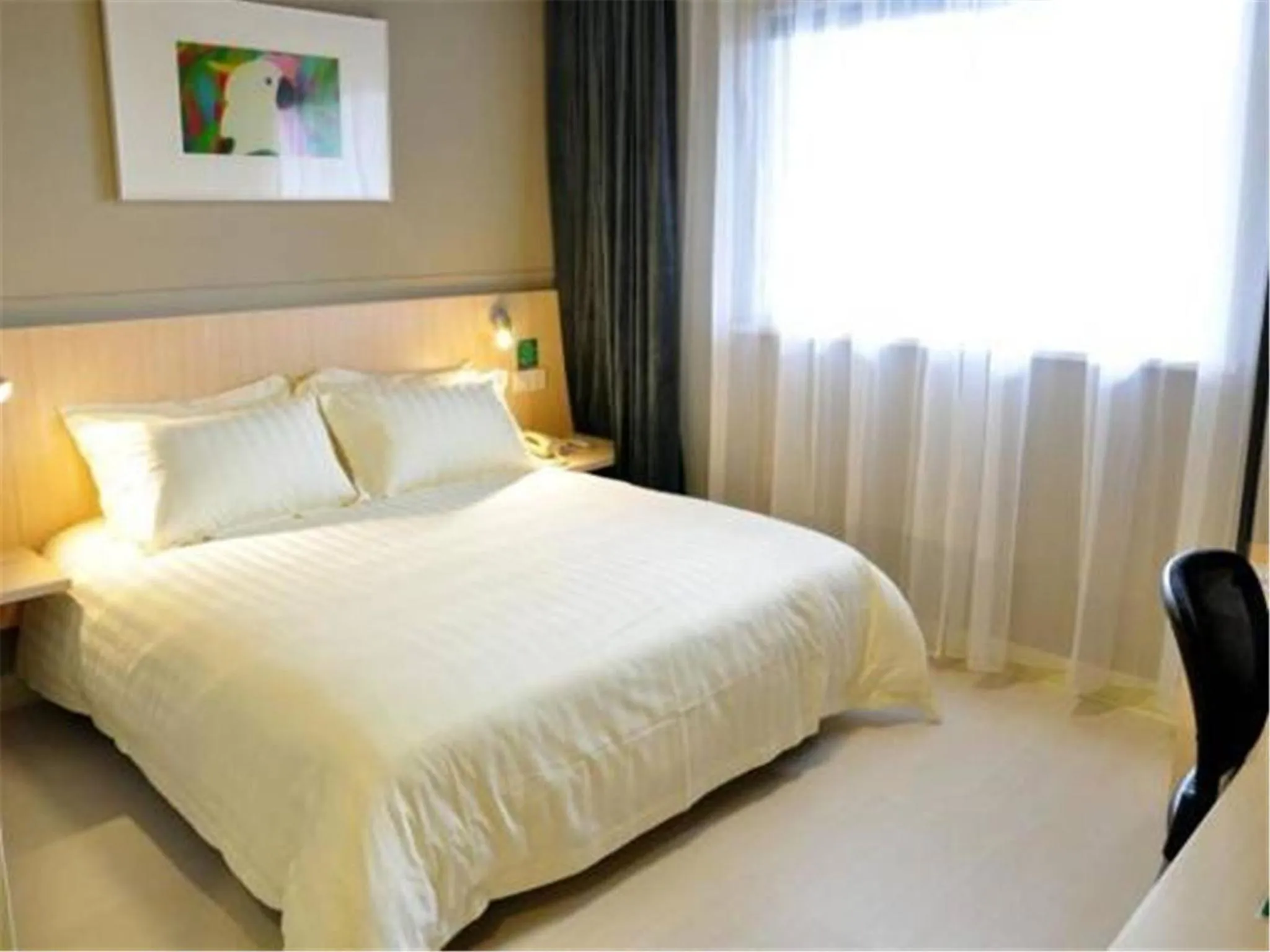 Bed in Jinjiang Inn Qingdao Cangkou Park