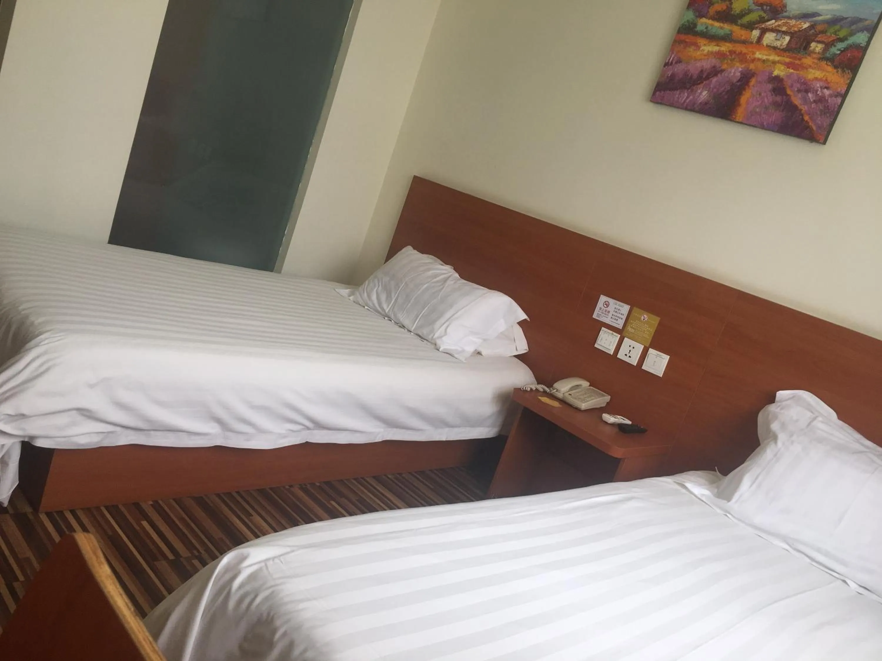 Decorative detail, Bed in Goldmet Inn Beojing Capital Airport Xinguozhan