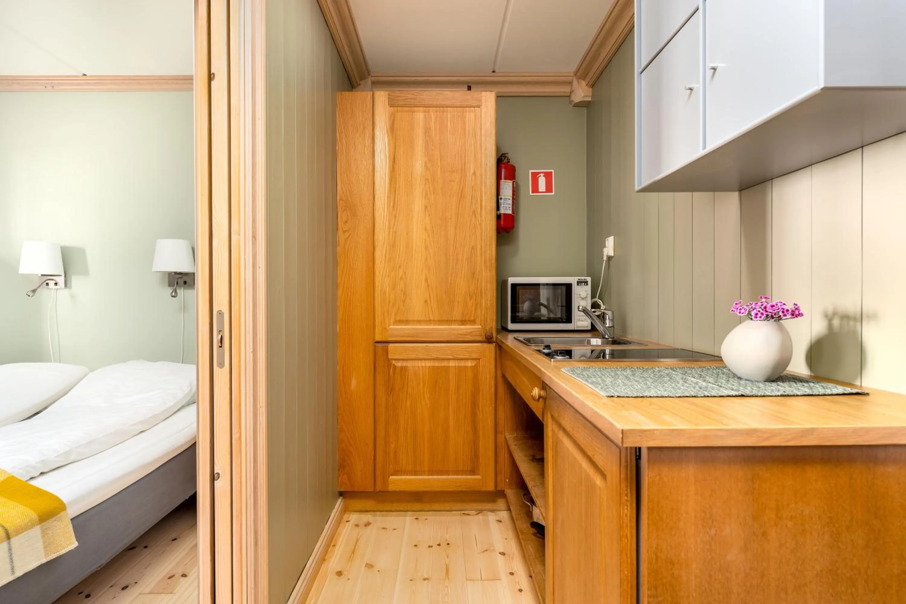 kitchen, Bed in Ilsetra Hotell