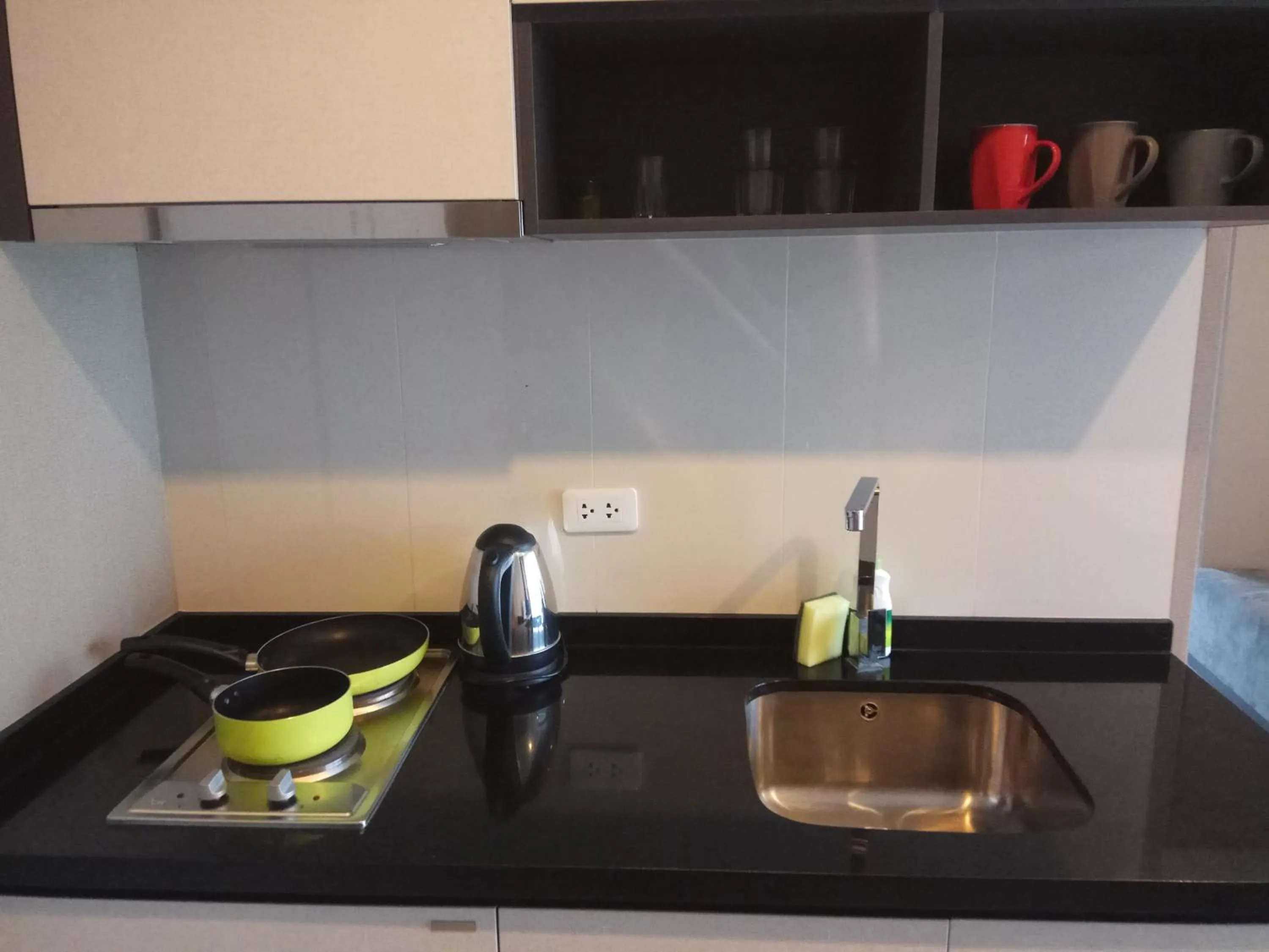 Kitchen or kitchenette in Many Holiday The Base Condo