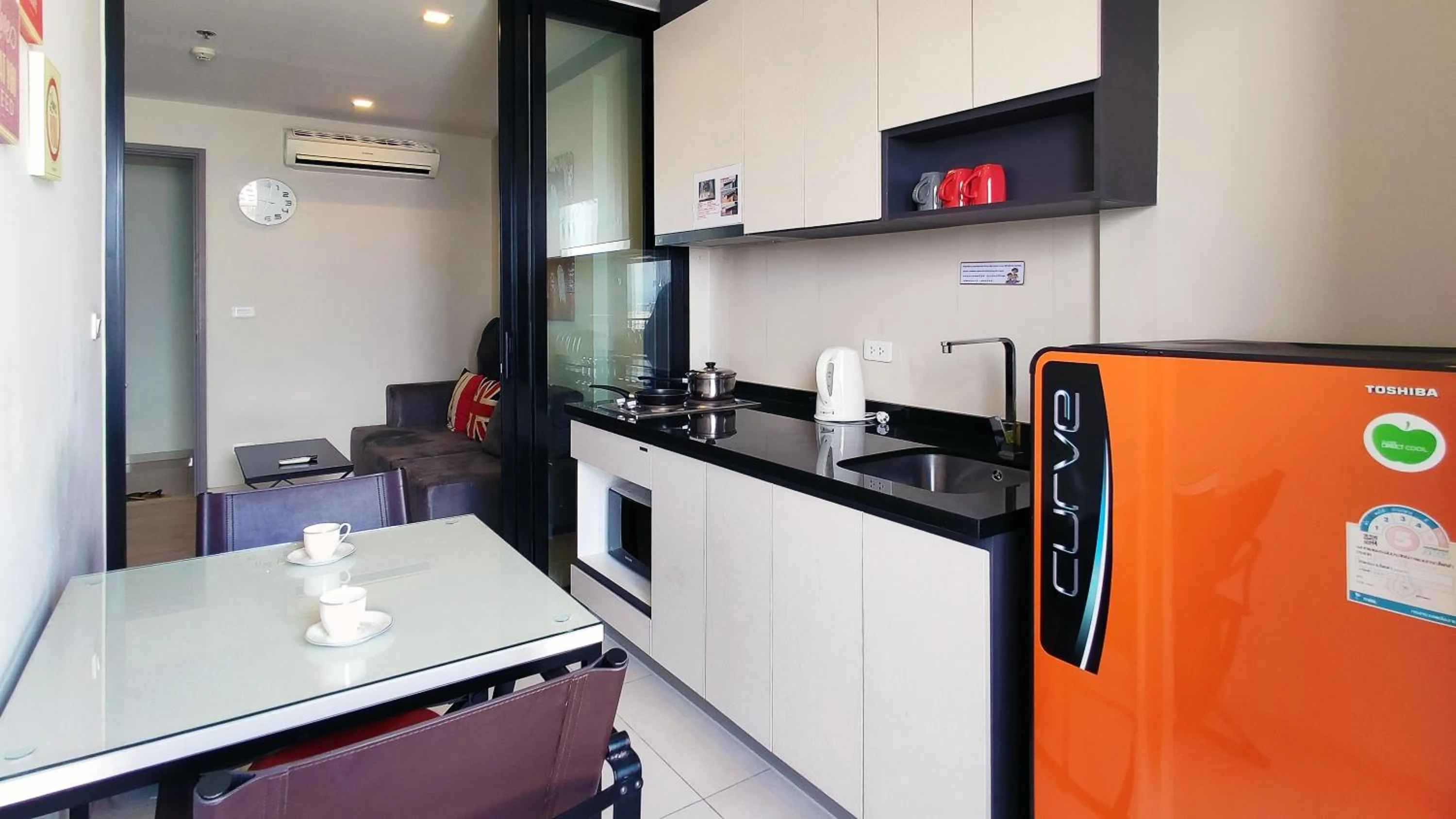 Kitchen or kitchenette in Many Holiday The Base Condo