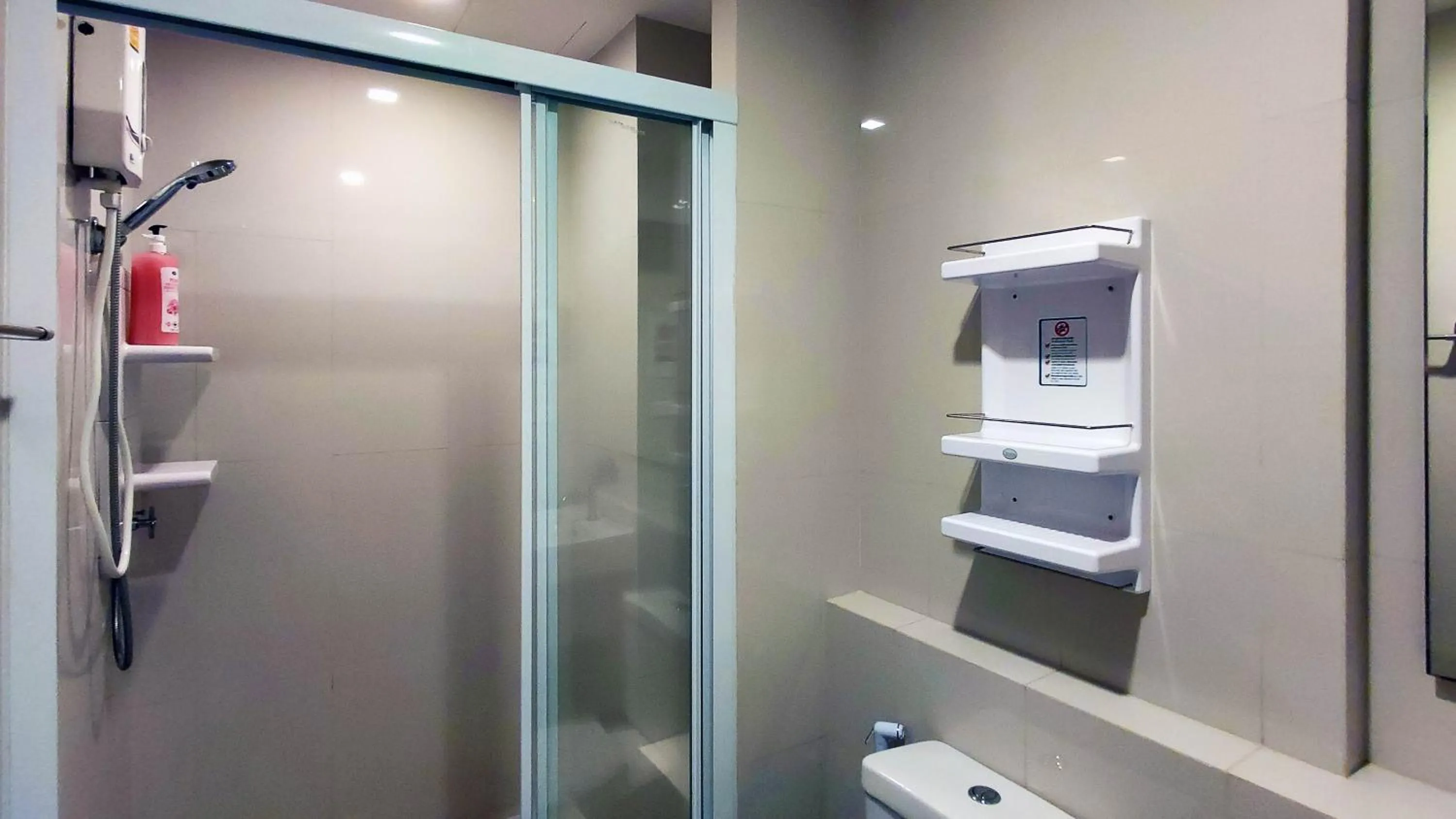 Bathroom in Many Holiday The Base Condo