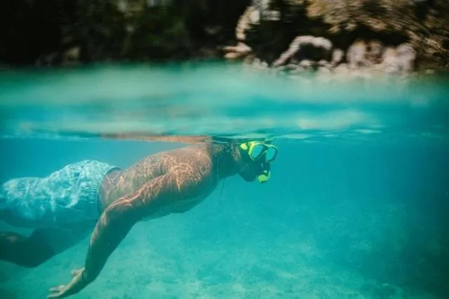 Snorkeling in Red Palm Village