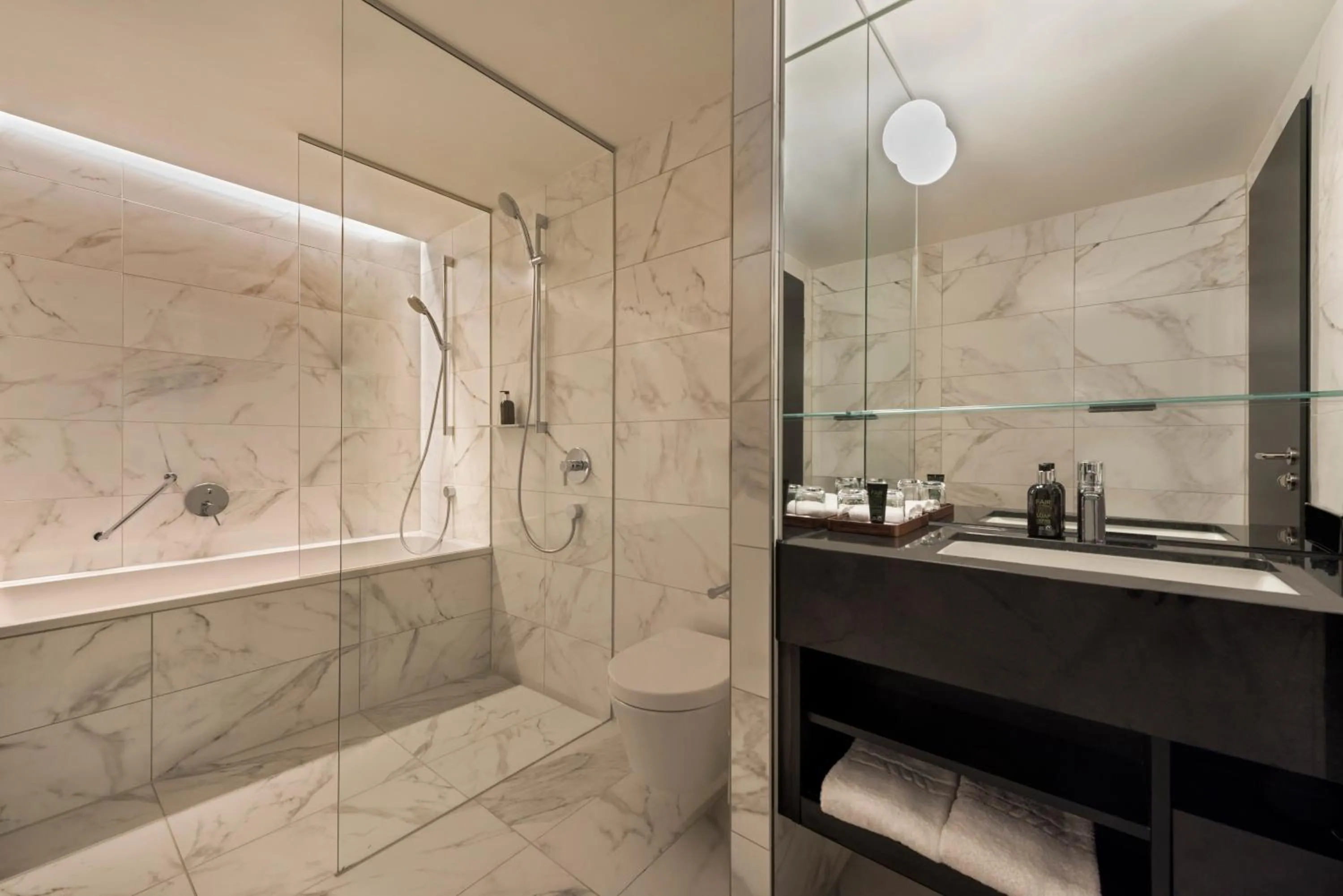 Bathroom in Adina Apartment Hotel Frankfurt Westend