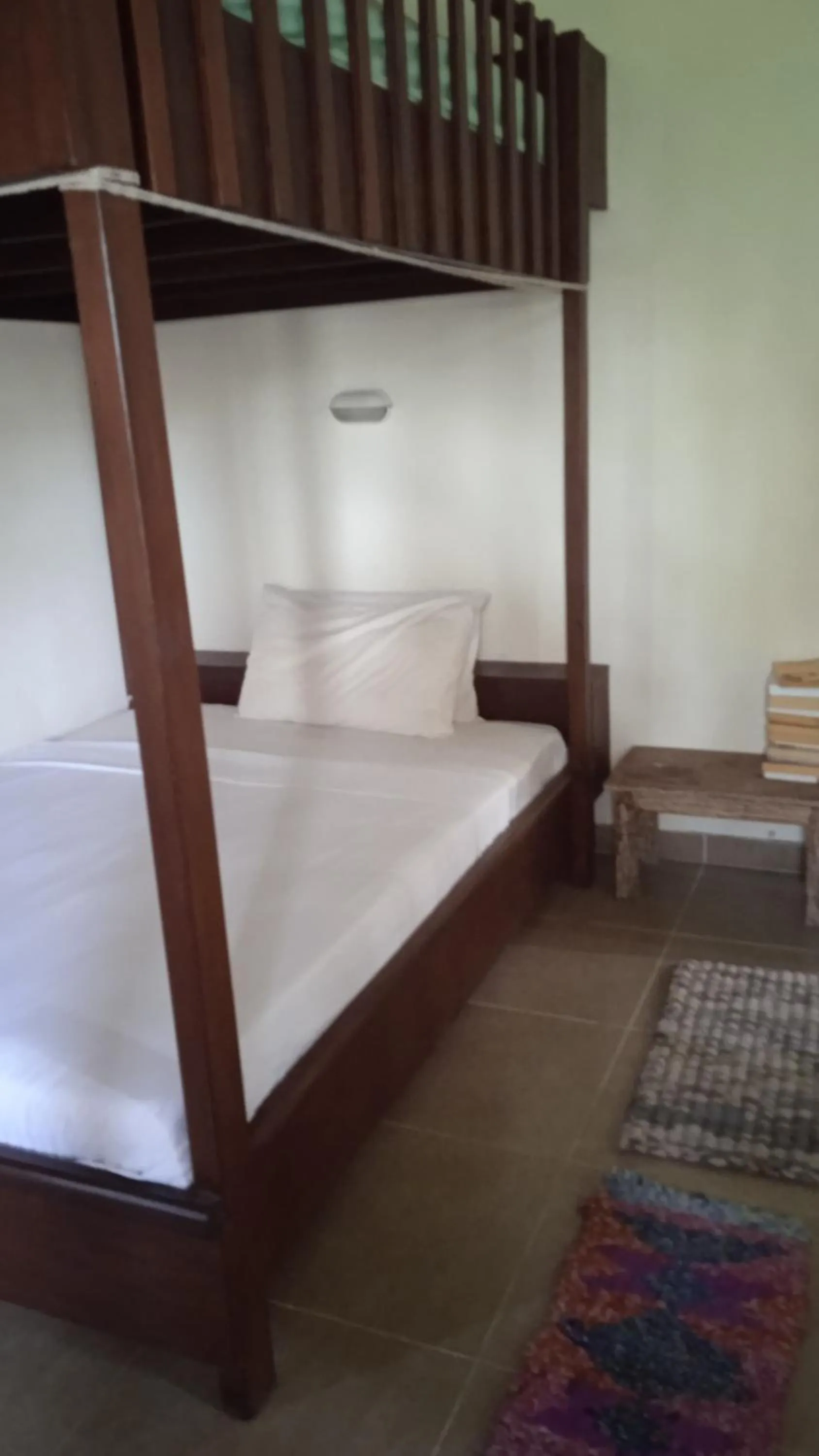 Bed in White Coconut Resort