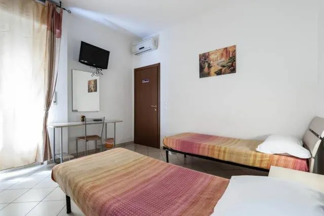 Day, Bed in Affittacamere Scotto