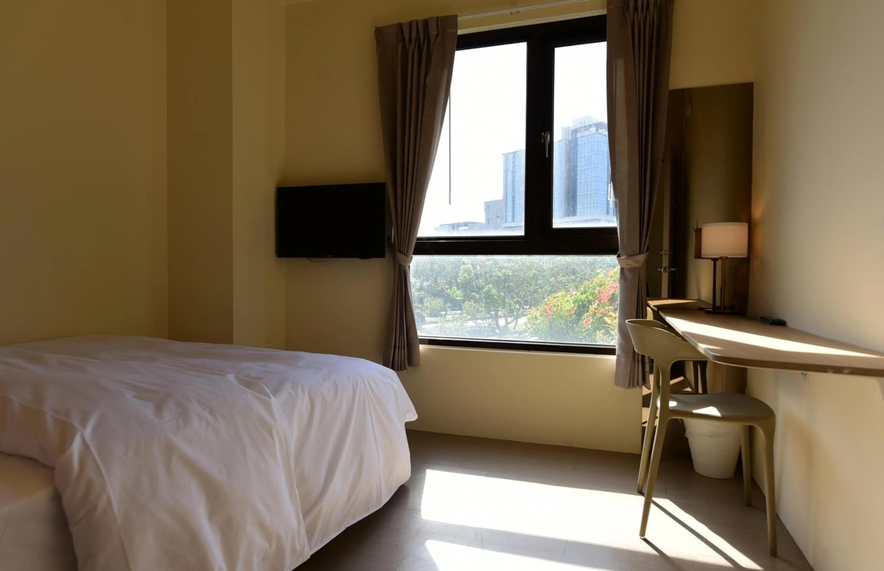 View (from property/room), Bed in Lütel Hotel Xpark Gloria Outlets Shin Kong Cinemas