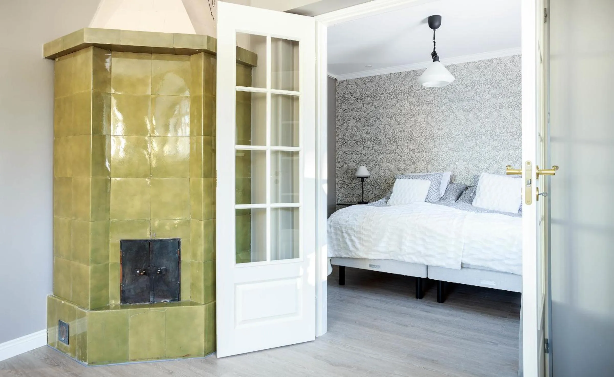 Bed in Harmooni Suites